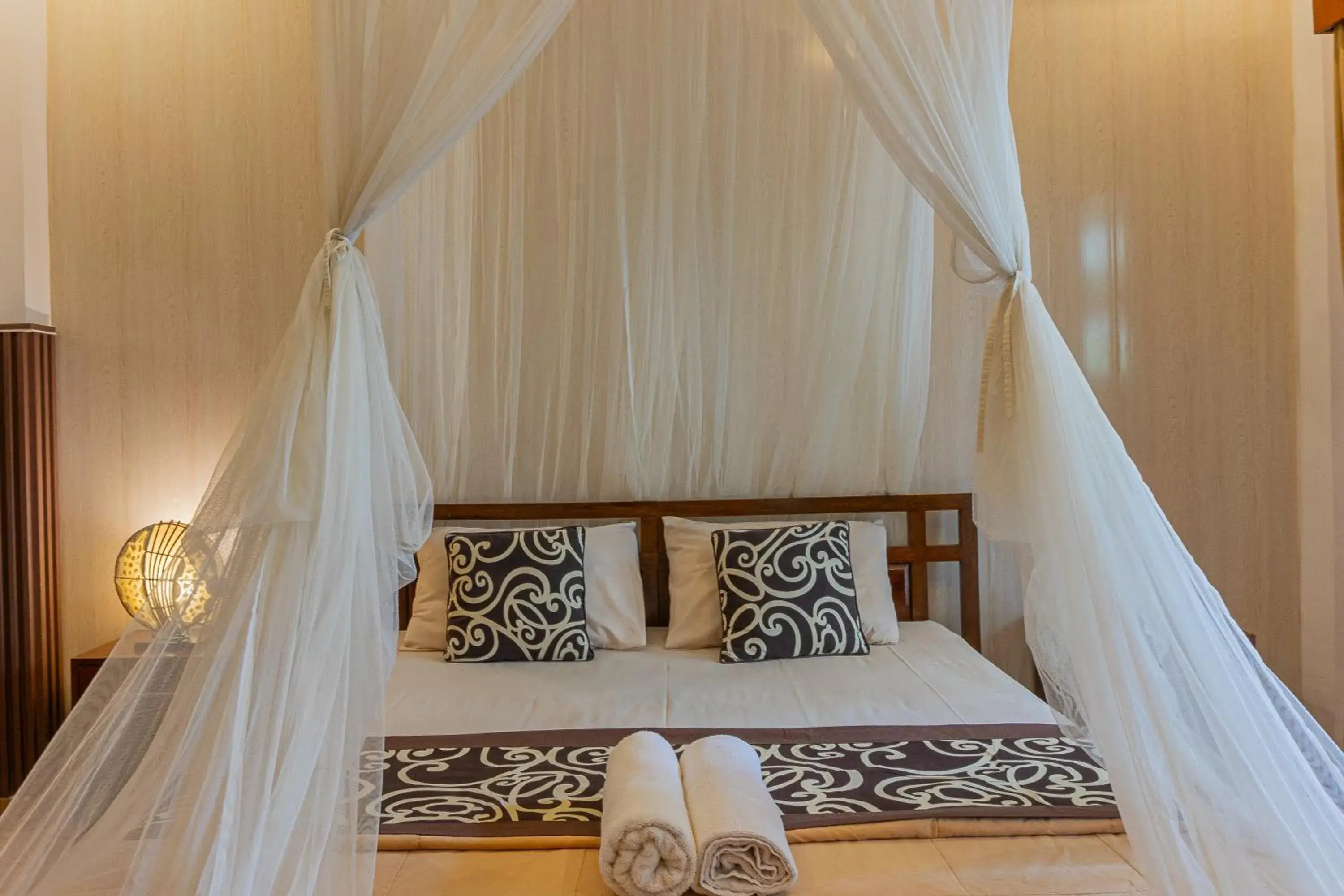 Bed in Artha Dewata Home Stay Bed in Artha Dewata Home Stay