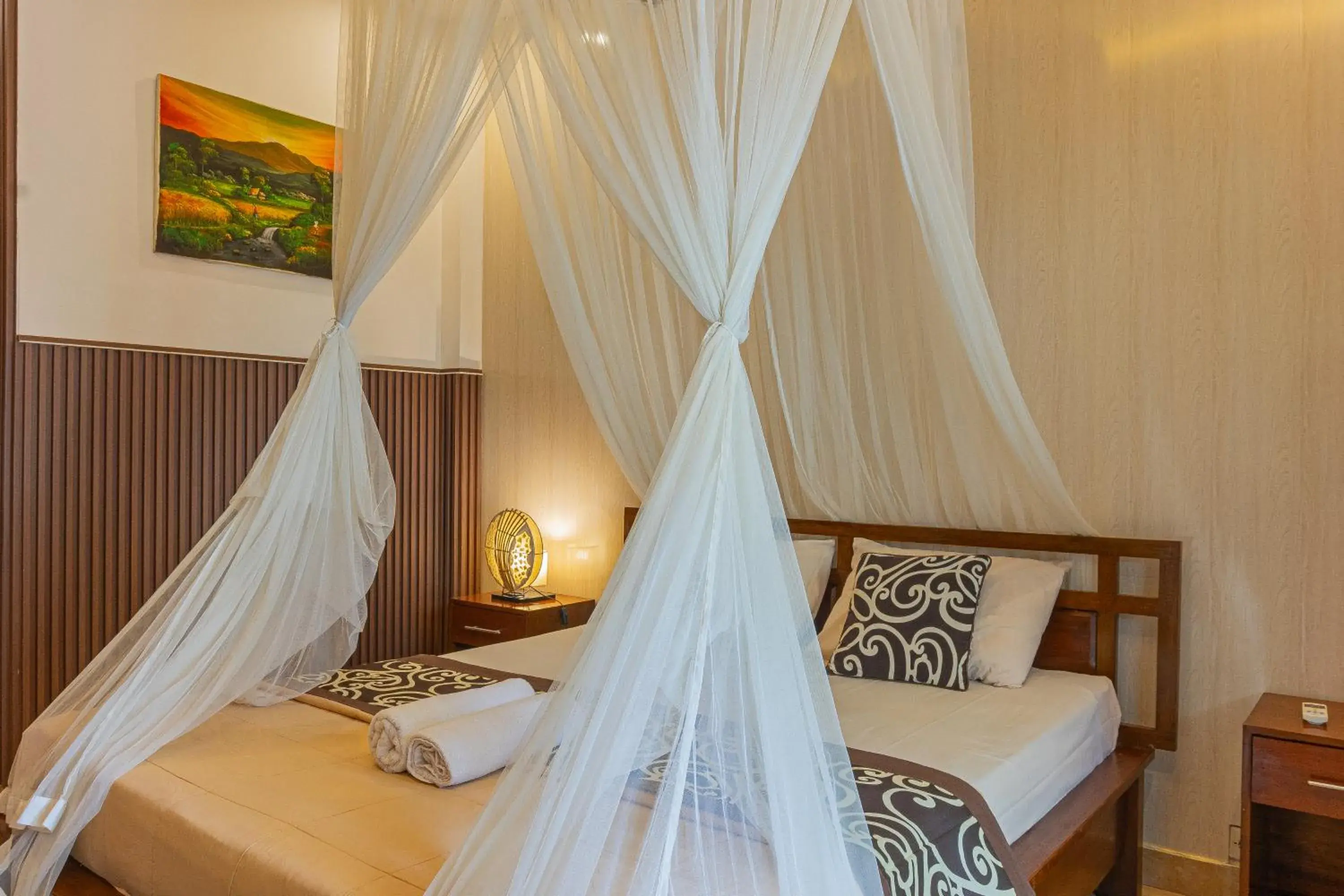 Bed in Artha Dewata Home Stay Bed in Artha Dewata Home Stay