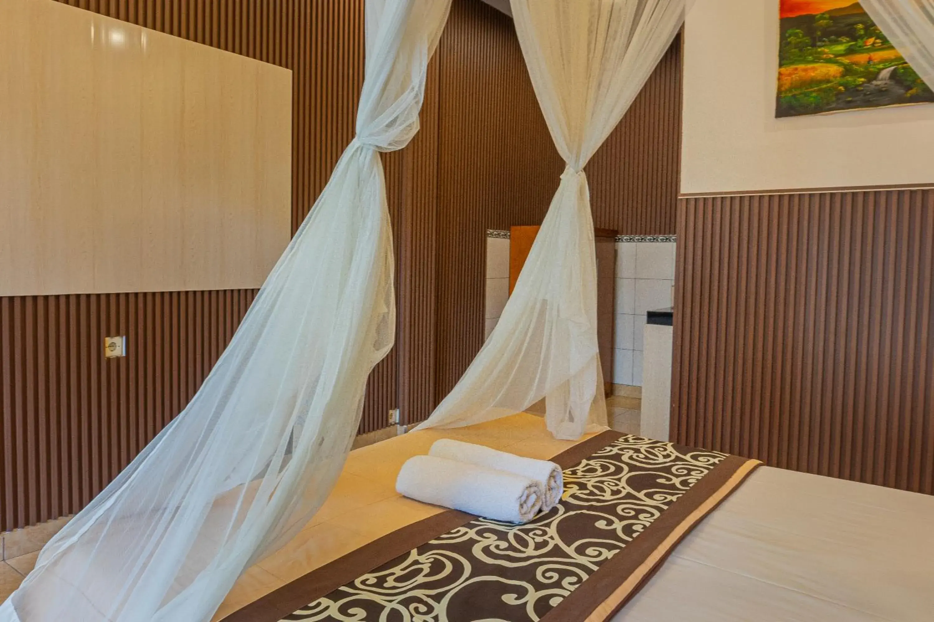Bed in Artha Dewata Home Stay Bed in Artha Dewata Home Stay