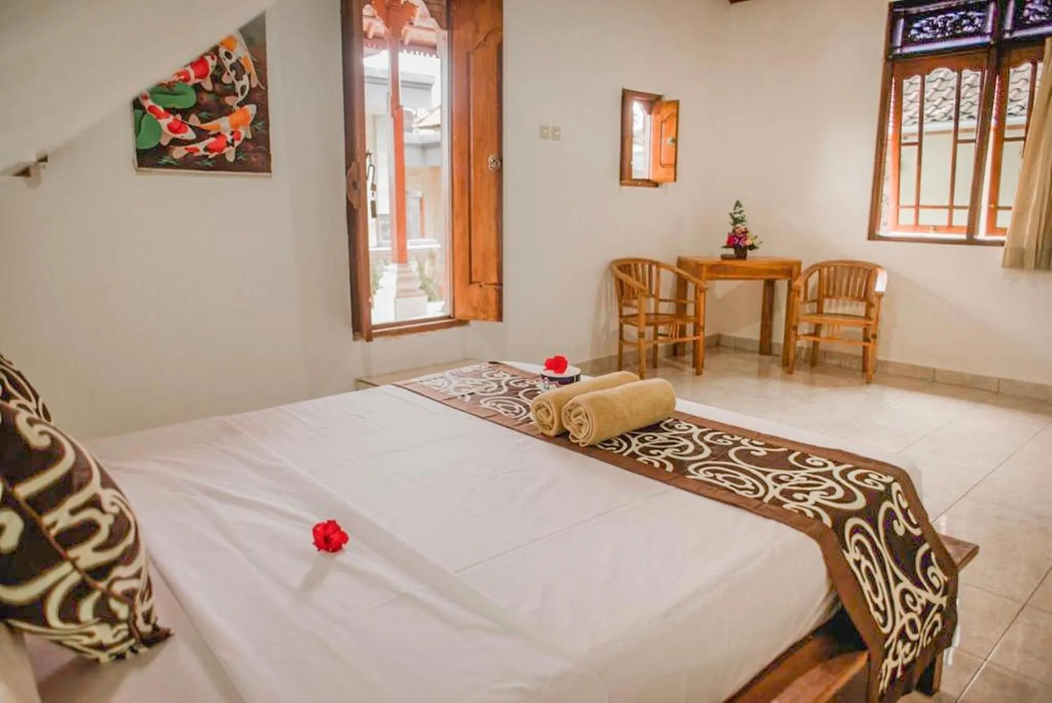 Bed in Artha Dewata Home Stay