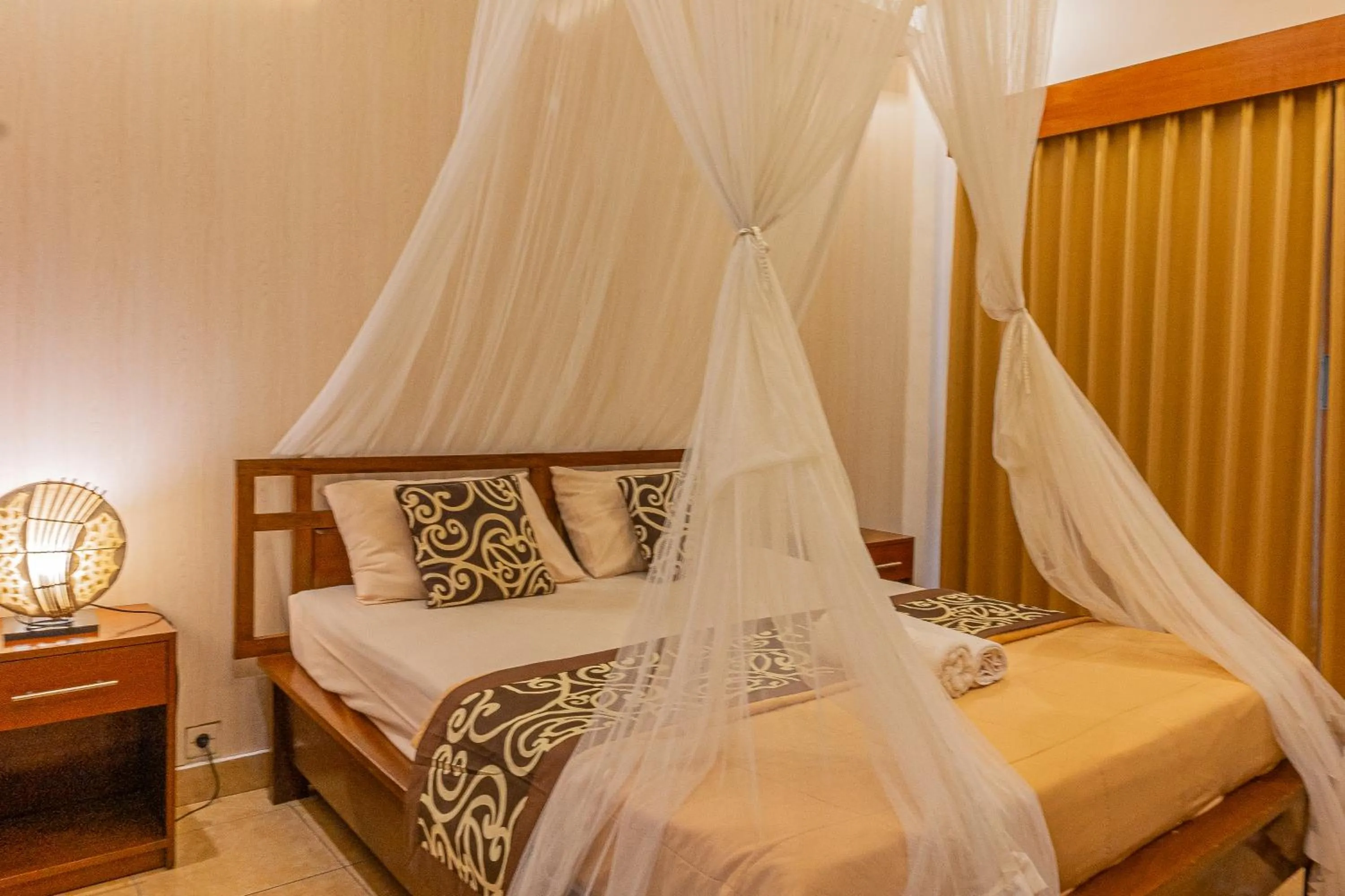 Bed in Artha Dewata Home Stay