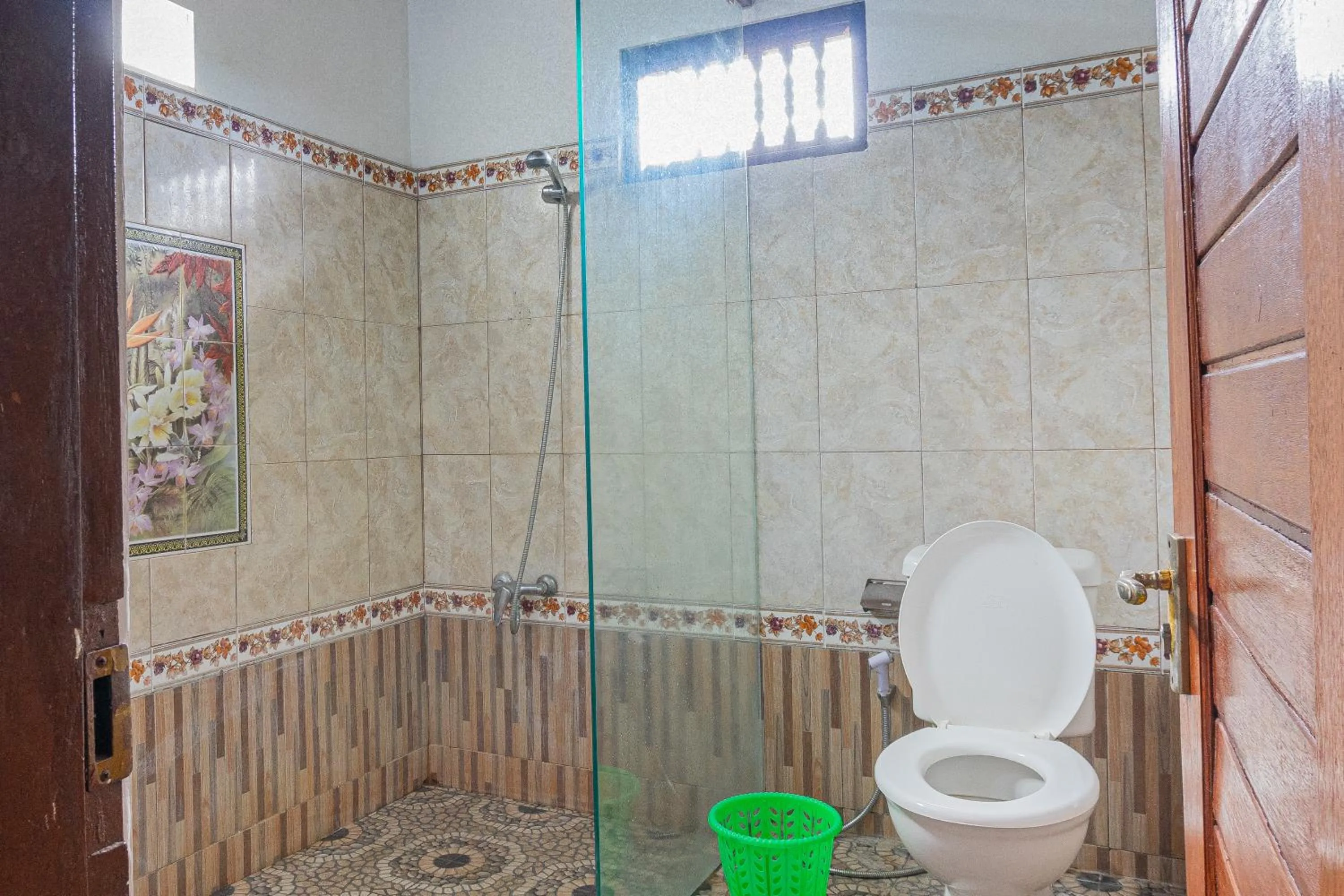 Shower in Artha Dewata Home Stay