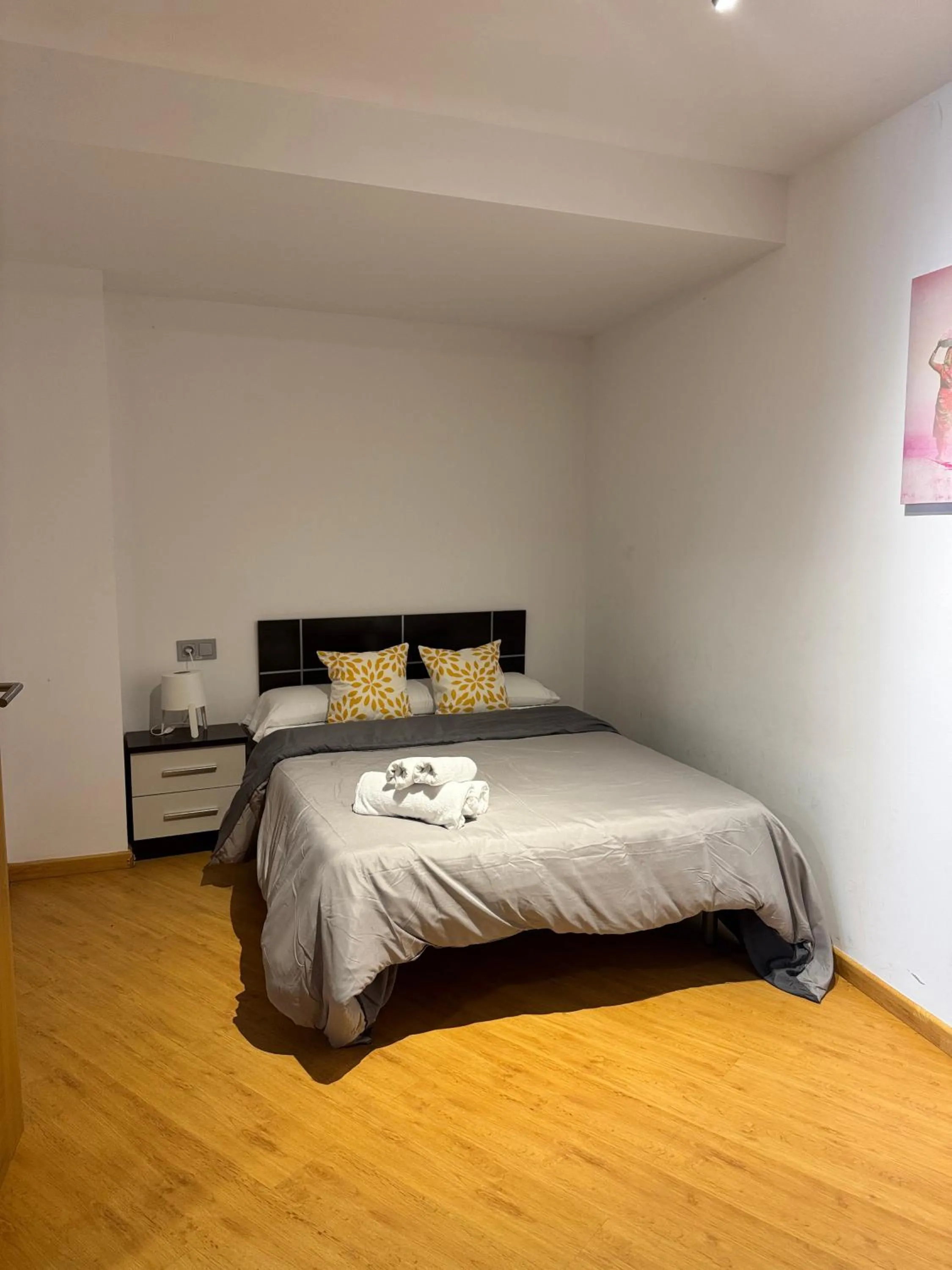 Bed in Wave Apartments