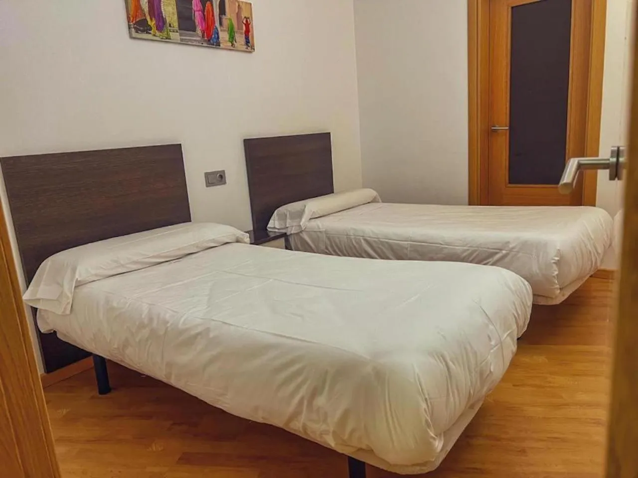 Bed in Wave Apartments