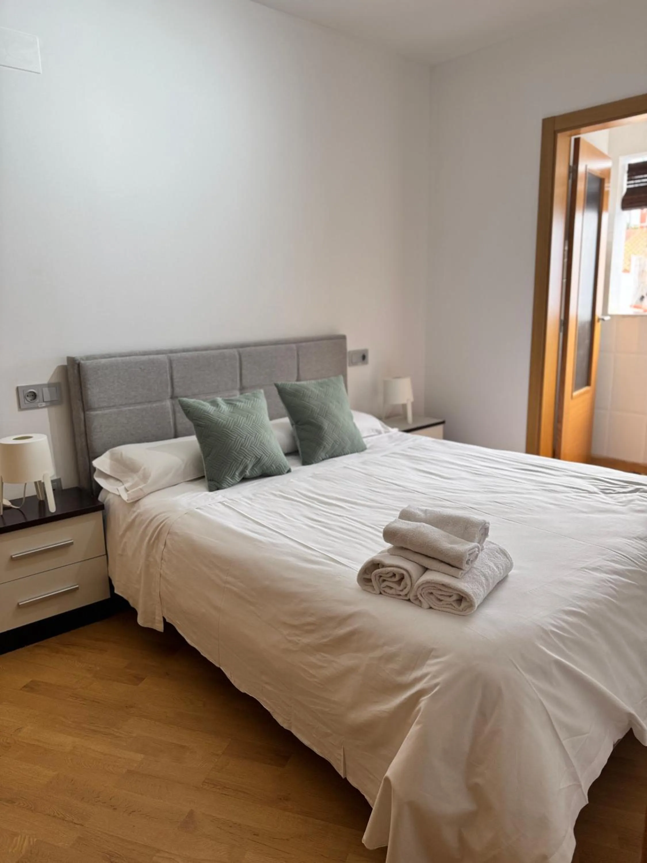 Bed in Wave Apartments