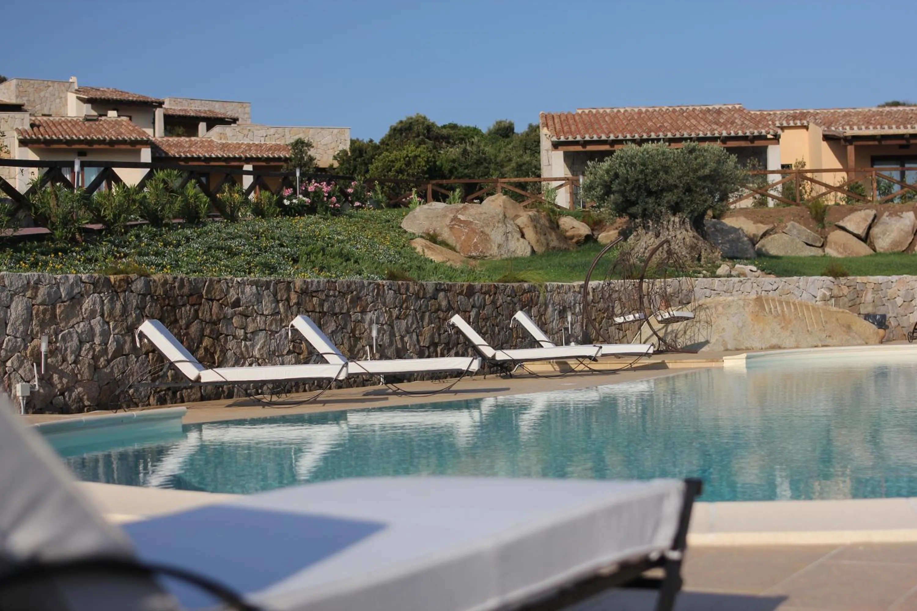Swimming pool in Punta Falcone Resort