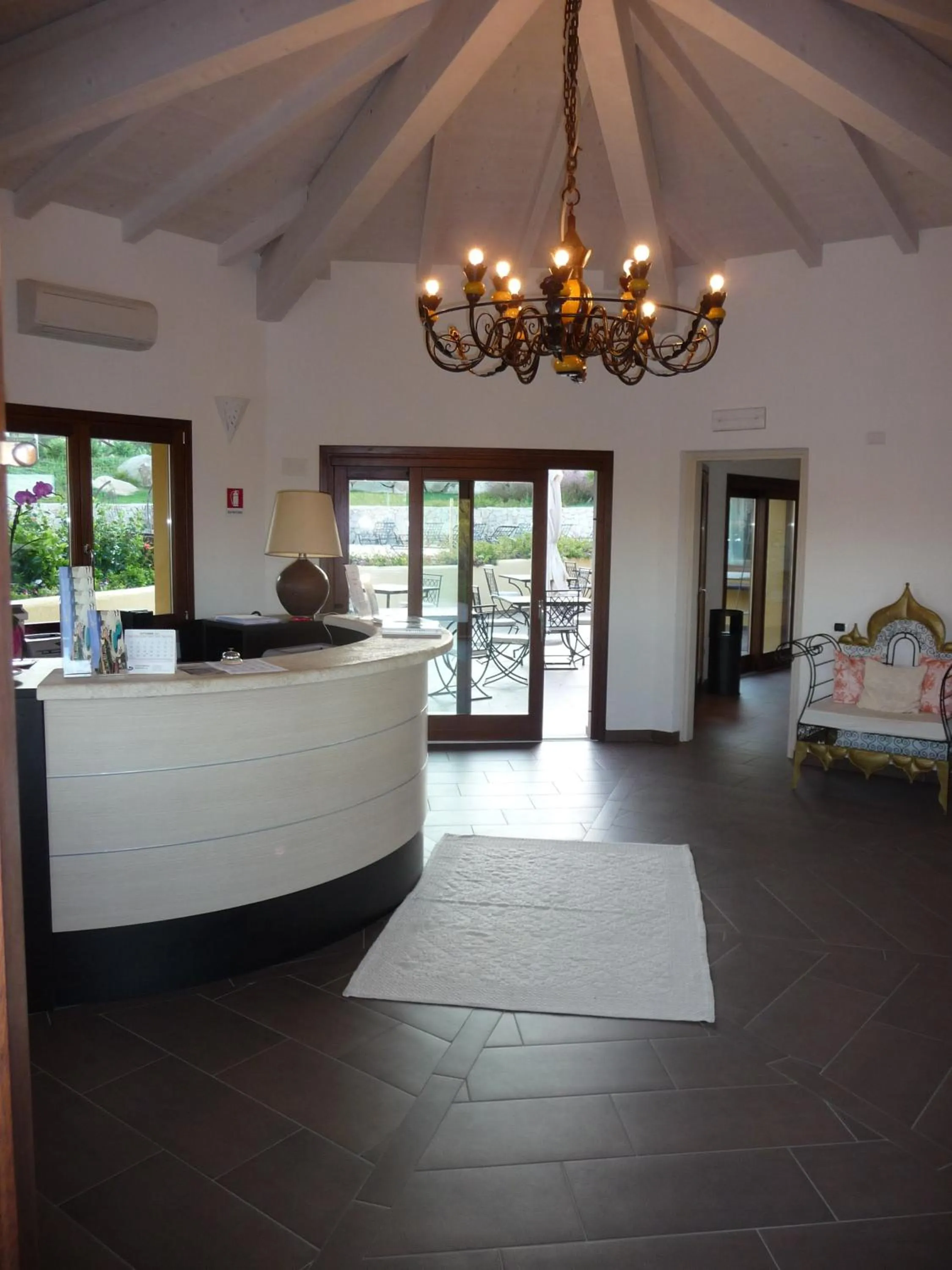Lobby or reception, Bed in Punta Falcone Resort