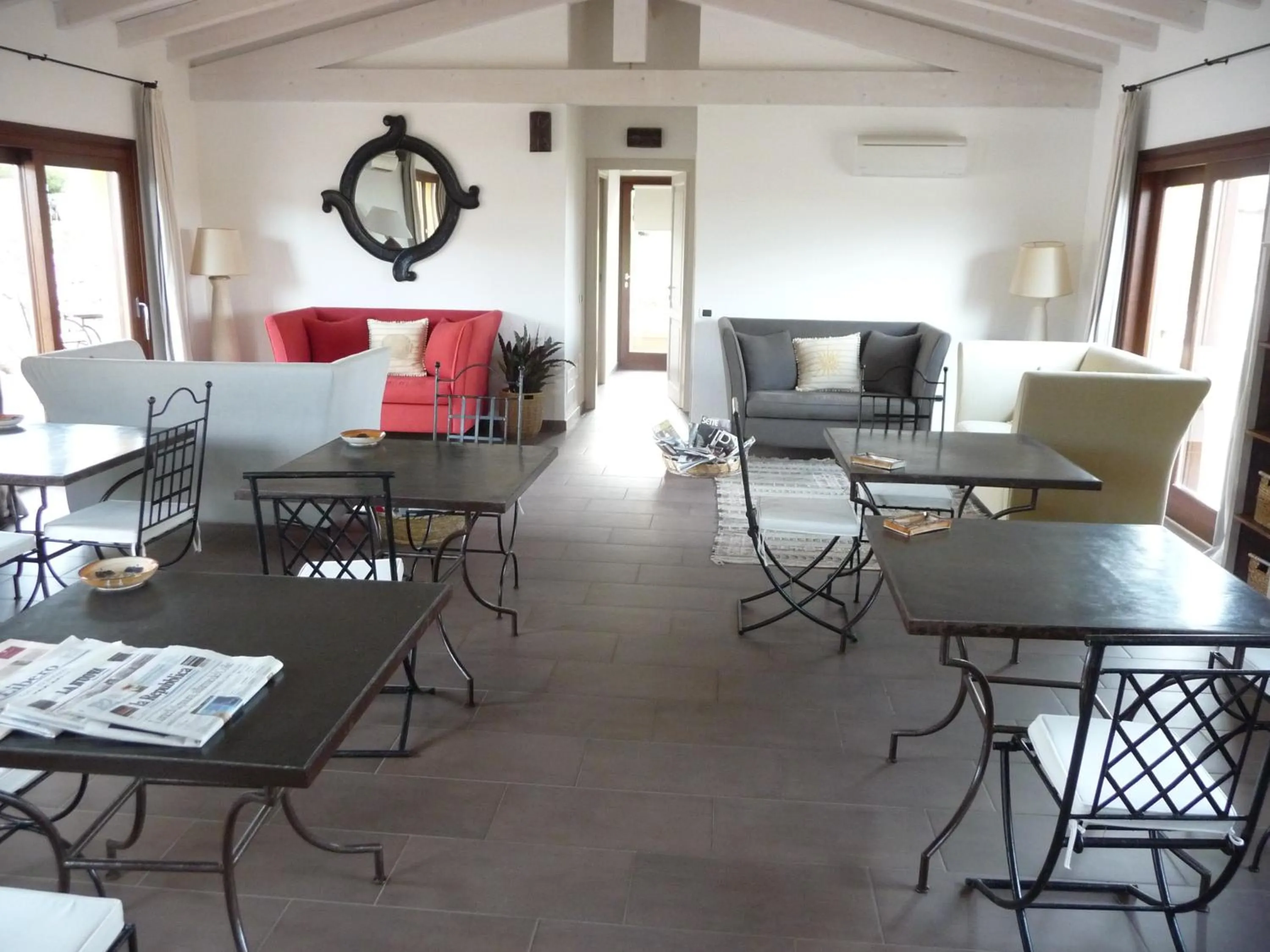 Communal lounge/ TV room in Punta Falcone Resort