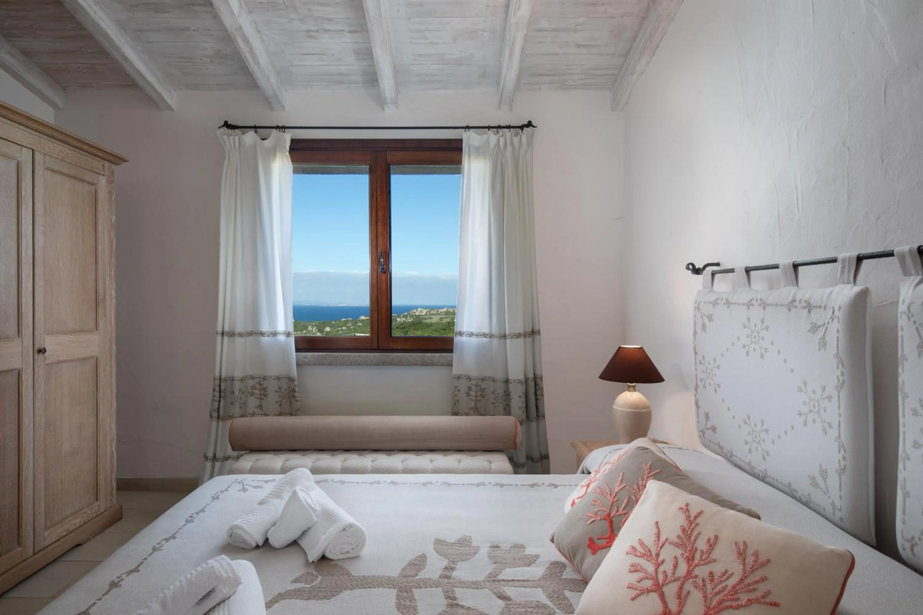 Photo of the whole room, Bed in Punta Falcone Resort