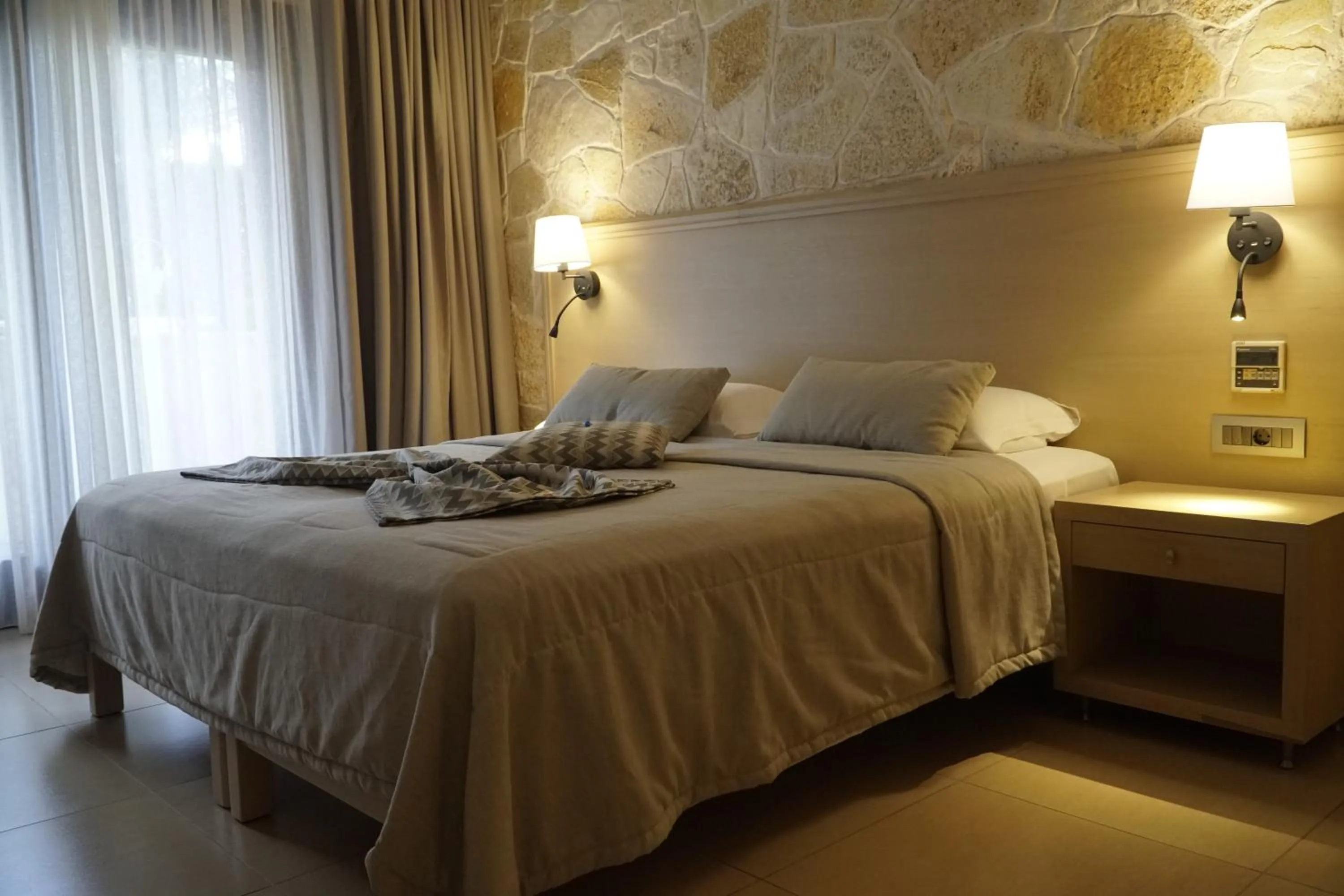 Bed in Cactus Royal Spa & Resort Adults Only