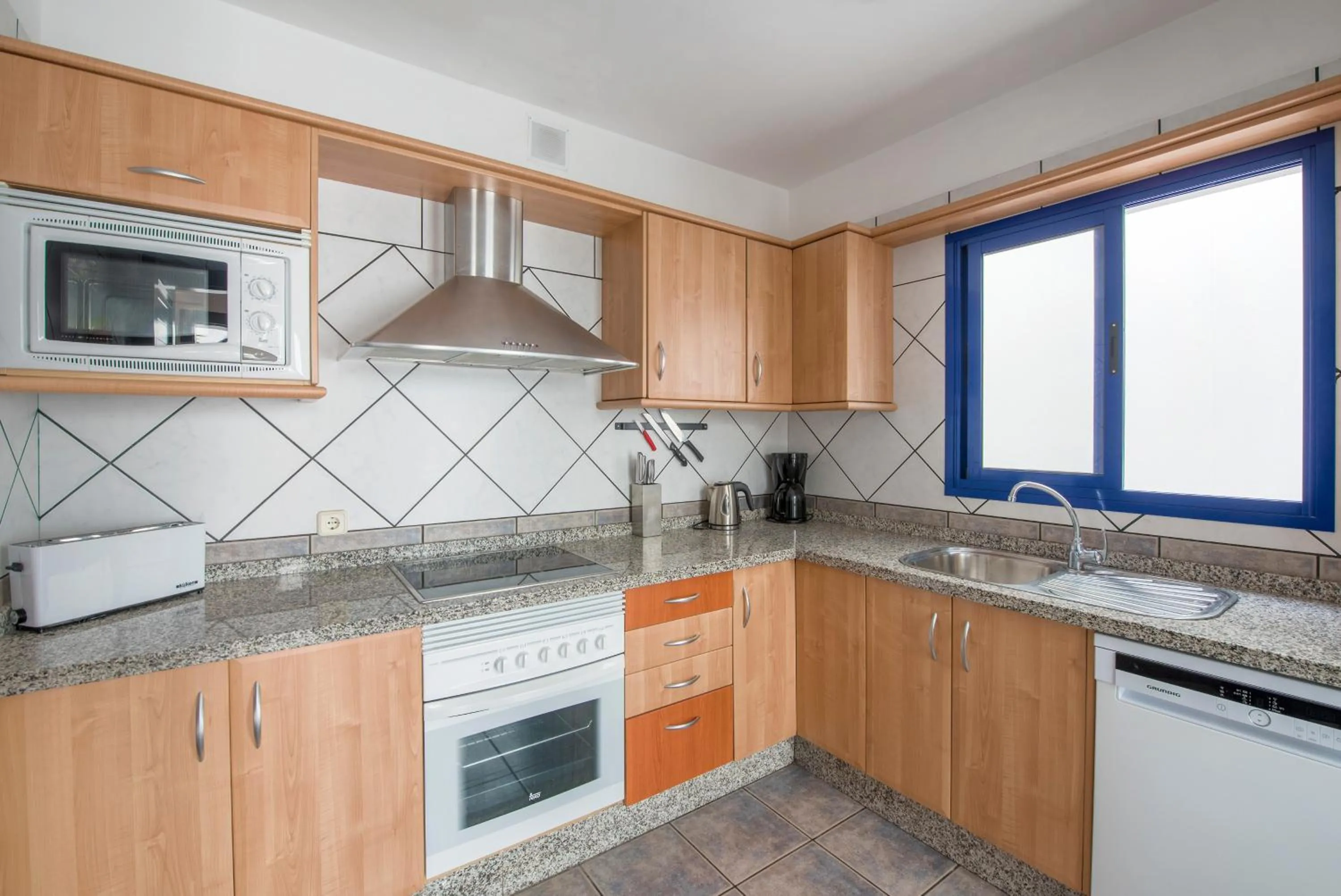 Kitchen or kitchenette in Villas Puerto Rubicon