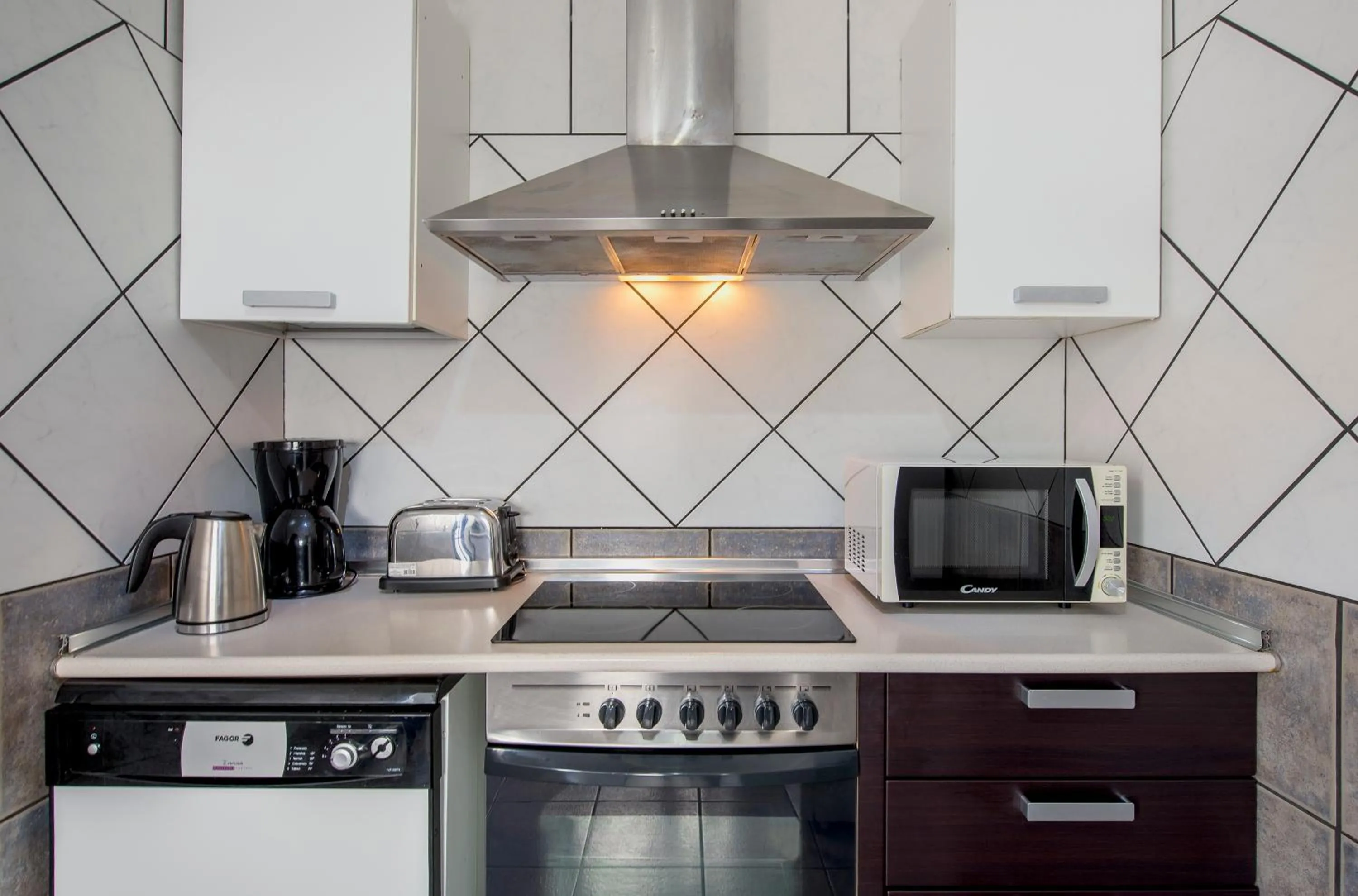 Kitchen or kitchenette in Villas Puerto Rubicon