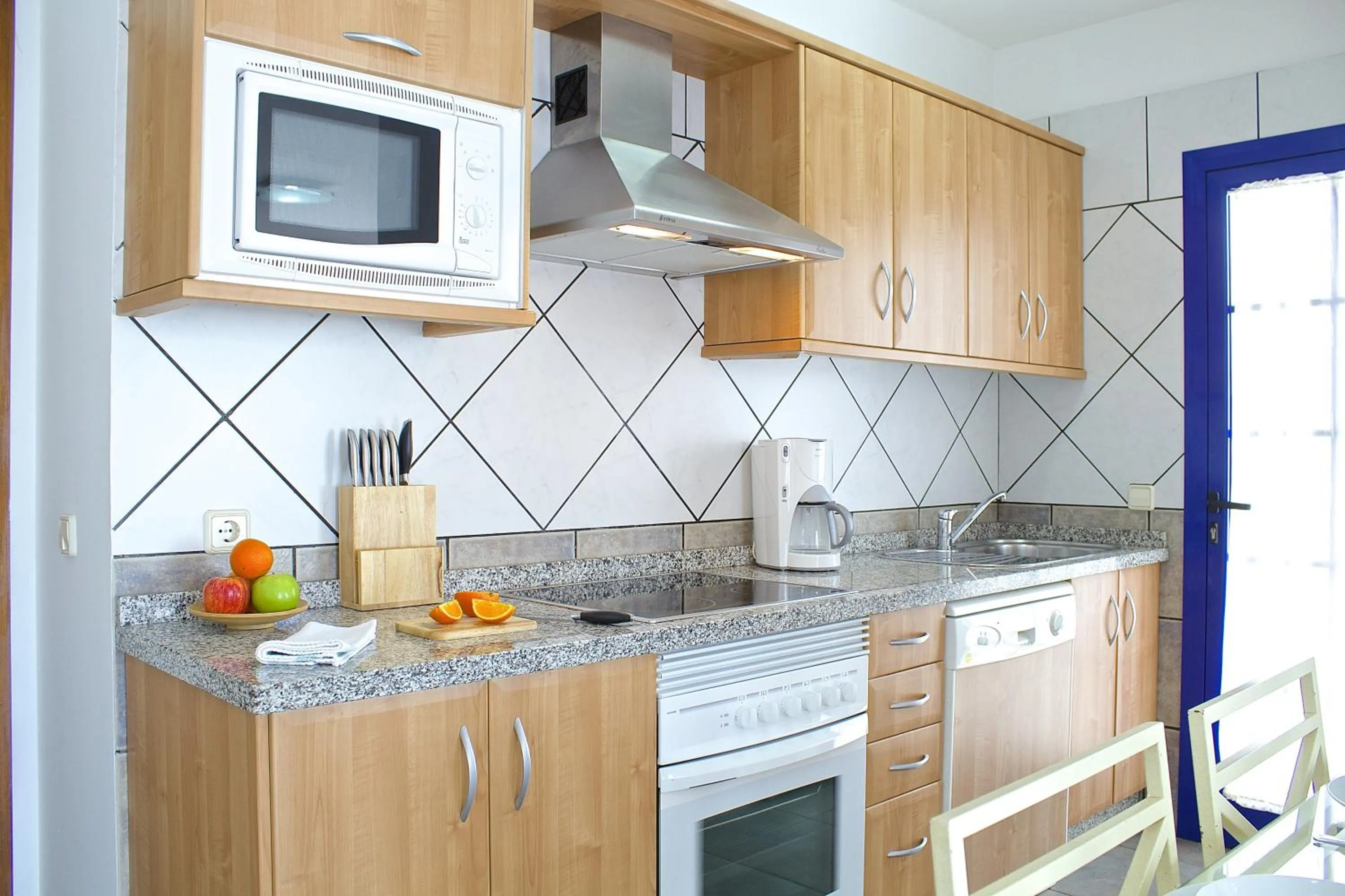 Kitchen or kitchenette in Villas Puerto Rubicon