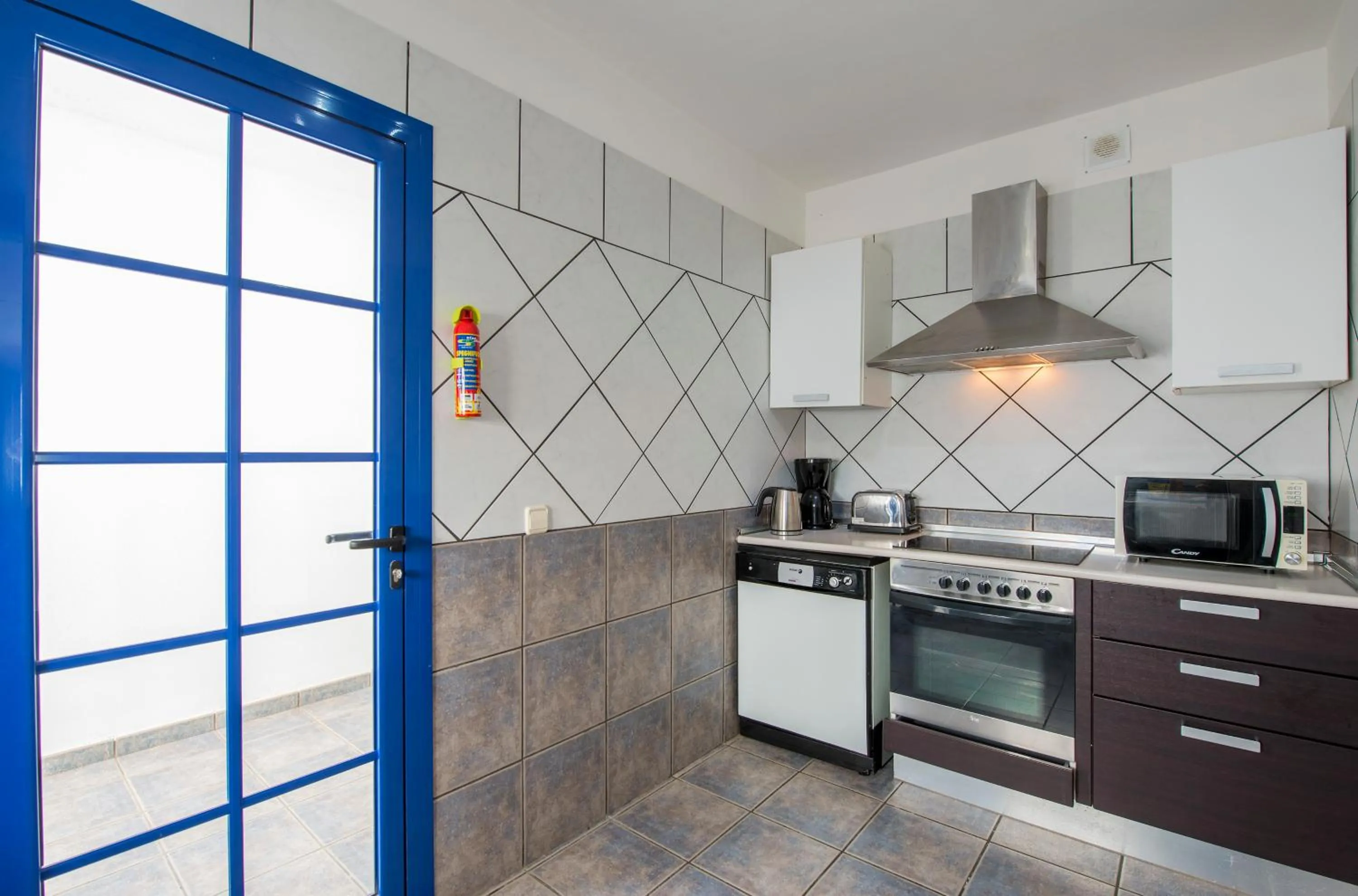 Kitchen or kitchenette in Villas Puerto Rubicon