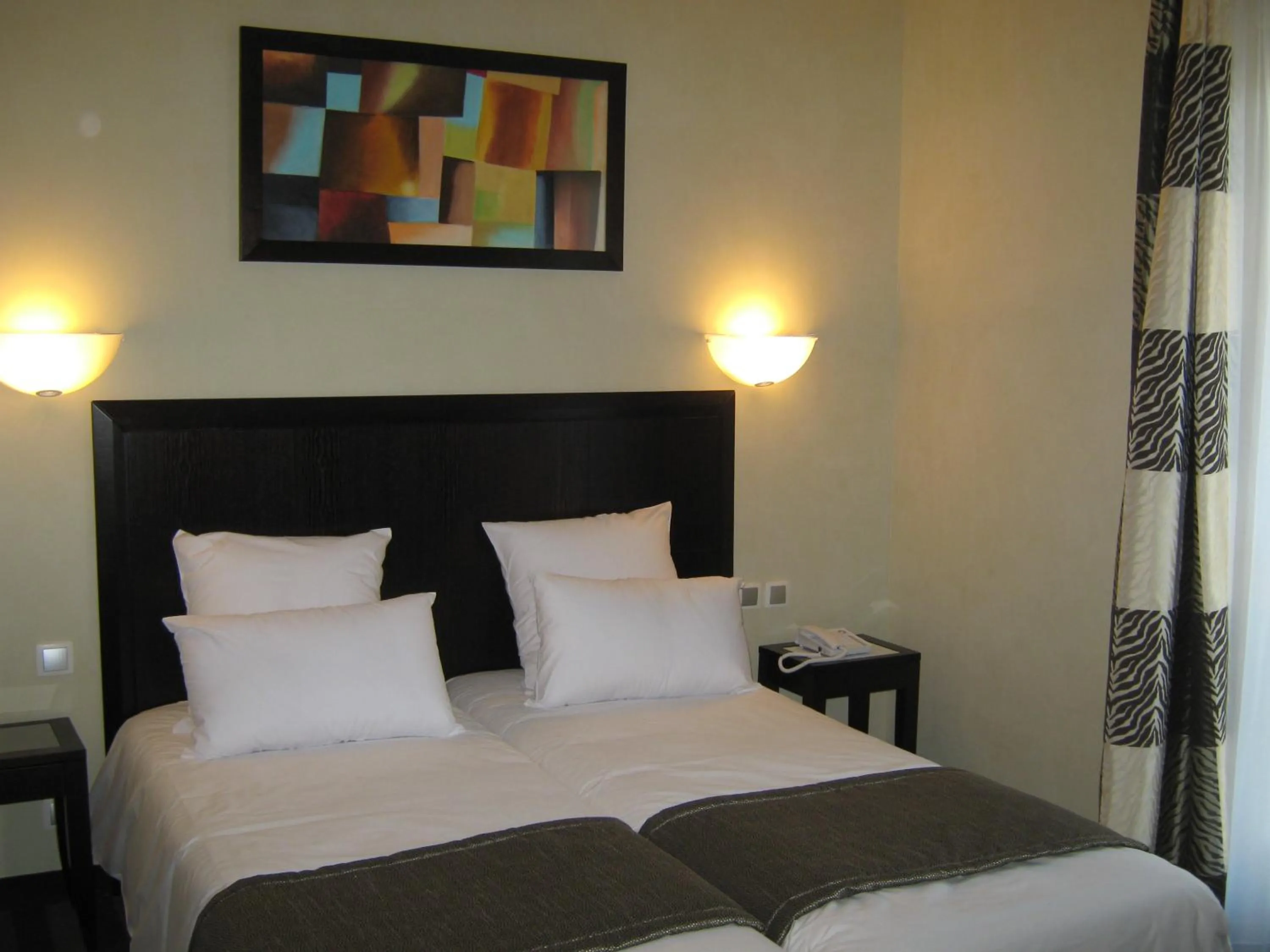 Decorative detail, Bed in Auberge Du Moulin Marin