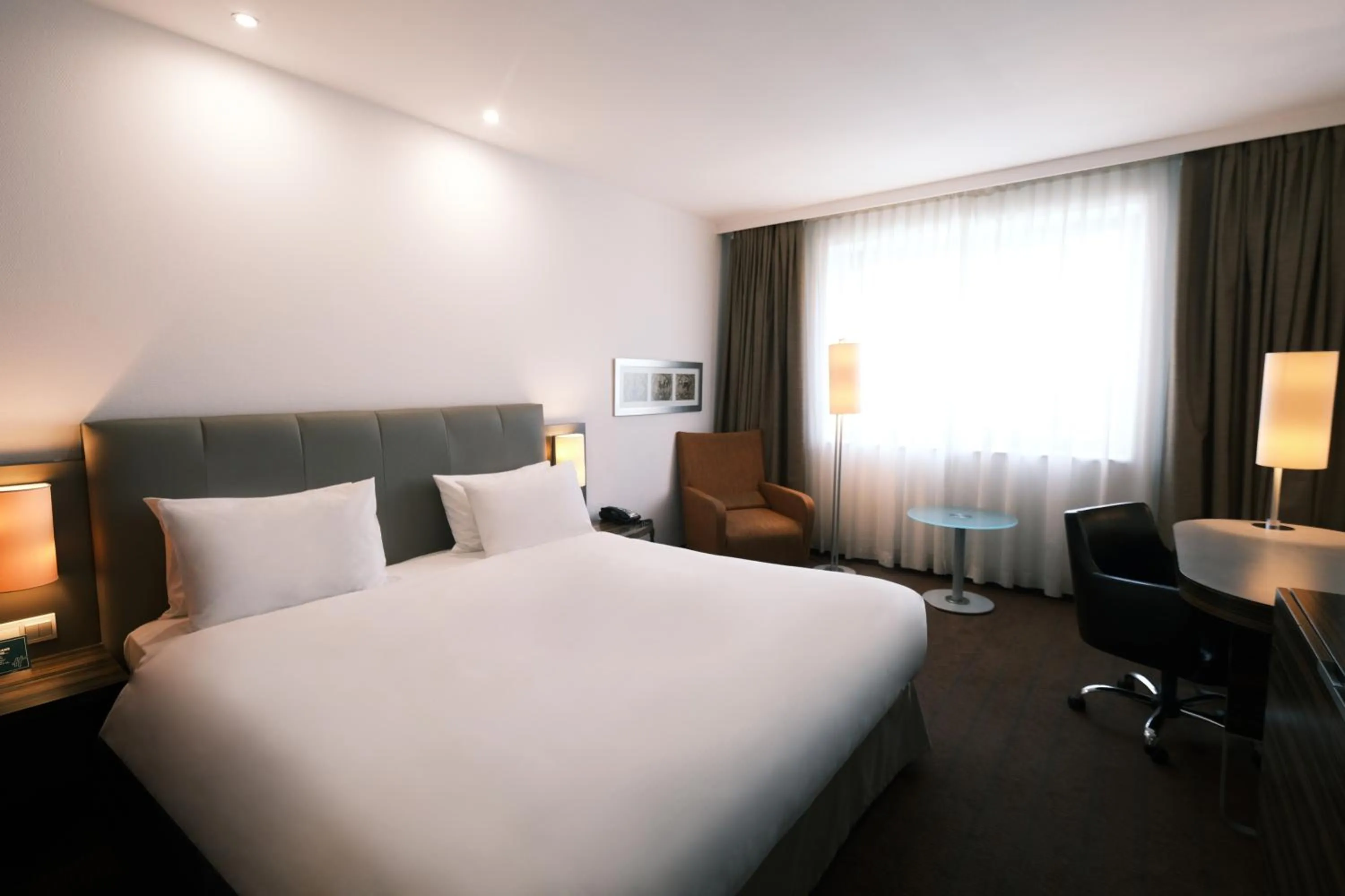 Photo of the whole room, Bed in Holiday Inn Almaty by IHG