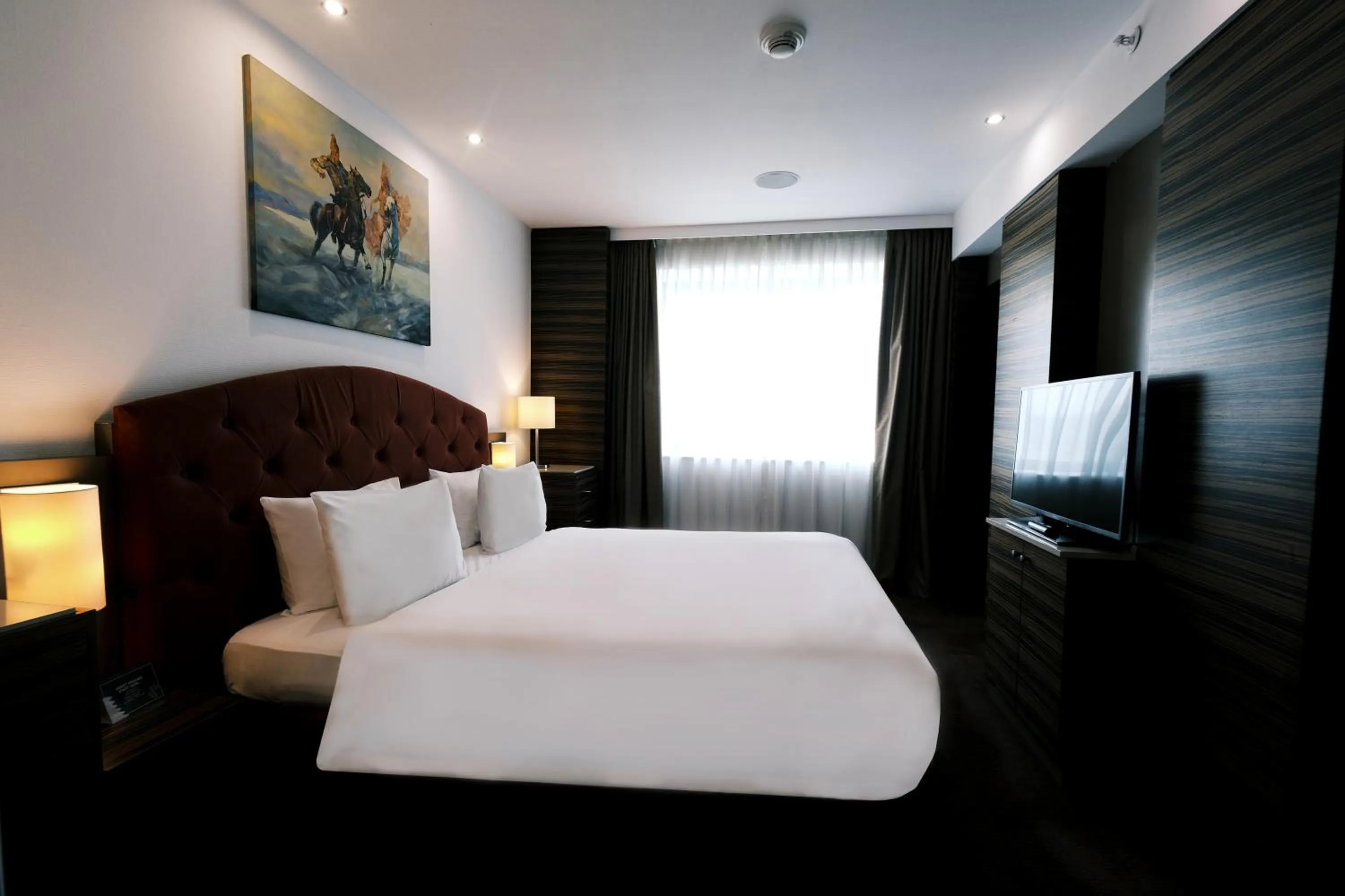 Photo of the whole room, Bed in Holiday Inn Almaty by IHG