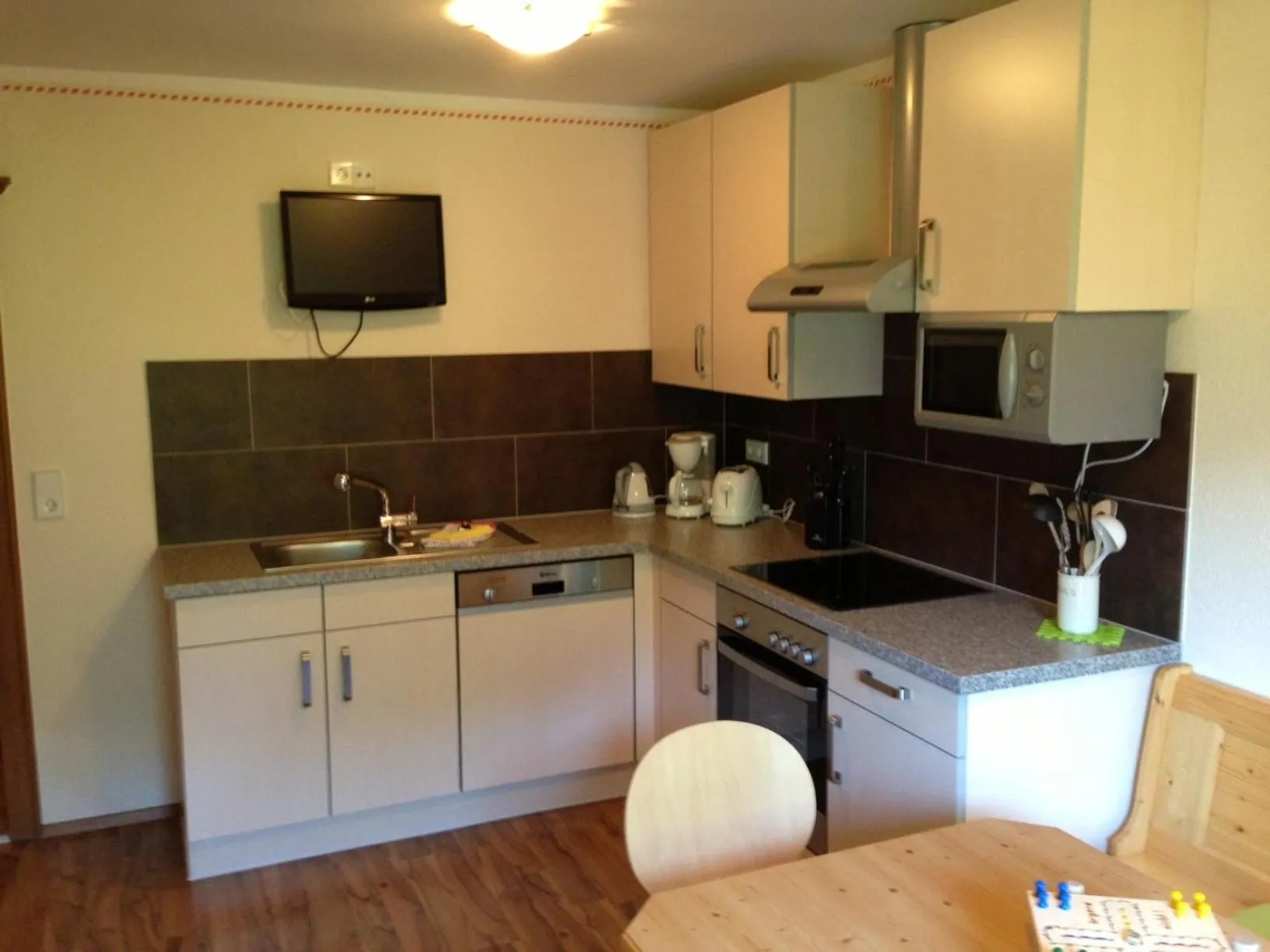 Kitchen or kitchenette in Appartements am See