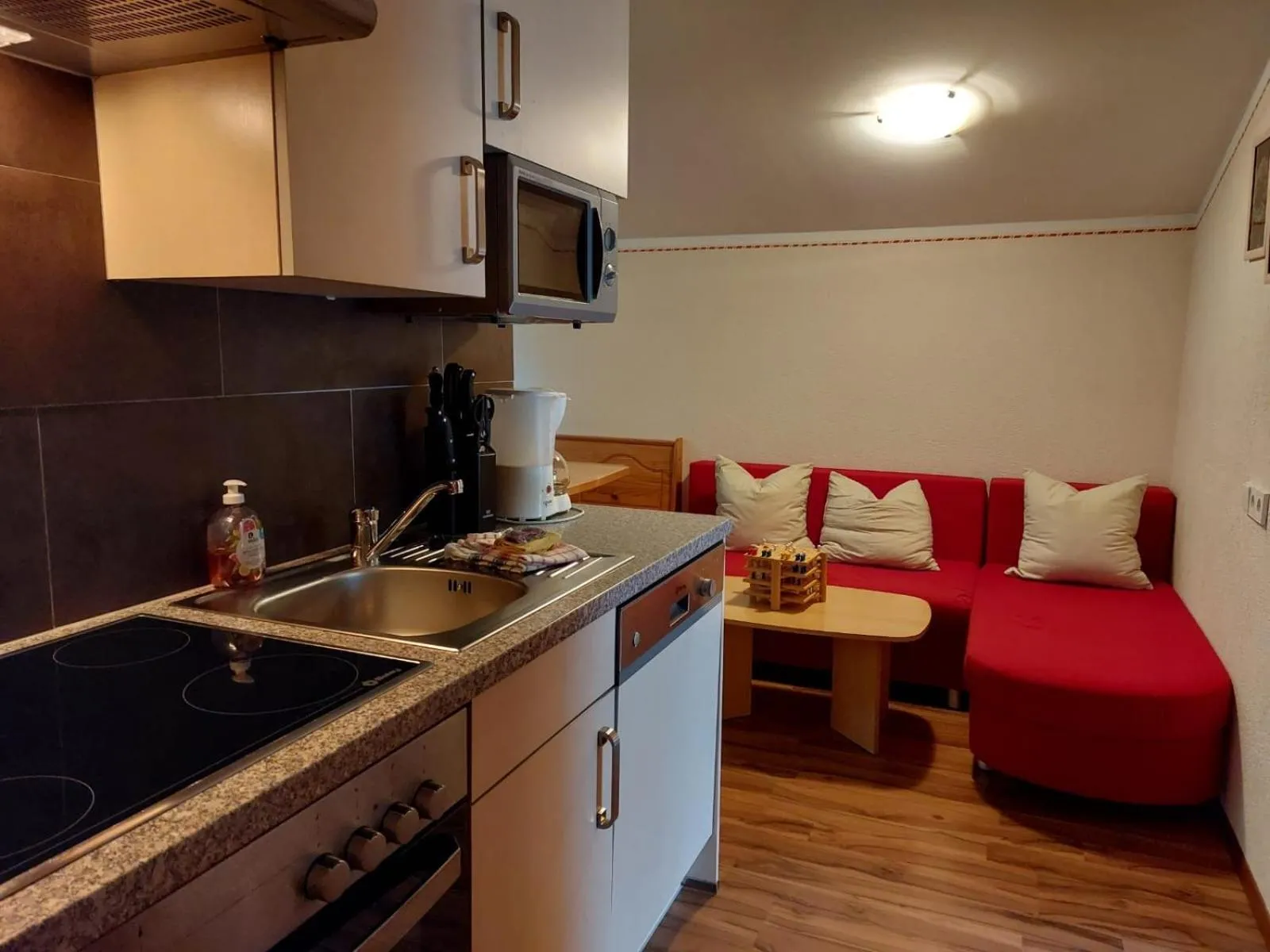 Kitchen or kitchenette in Appartements am See