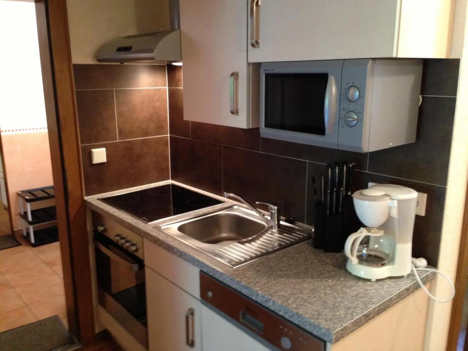 Kitchen or kitchenette in Appartements am See