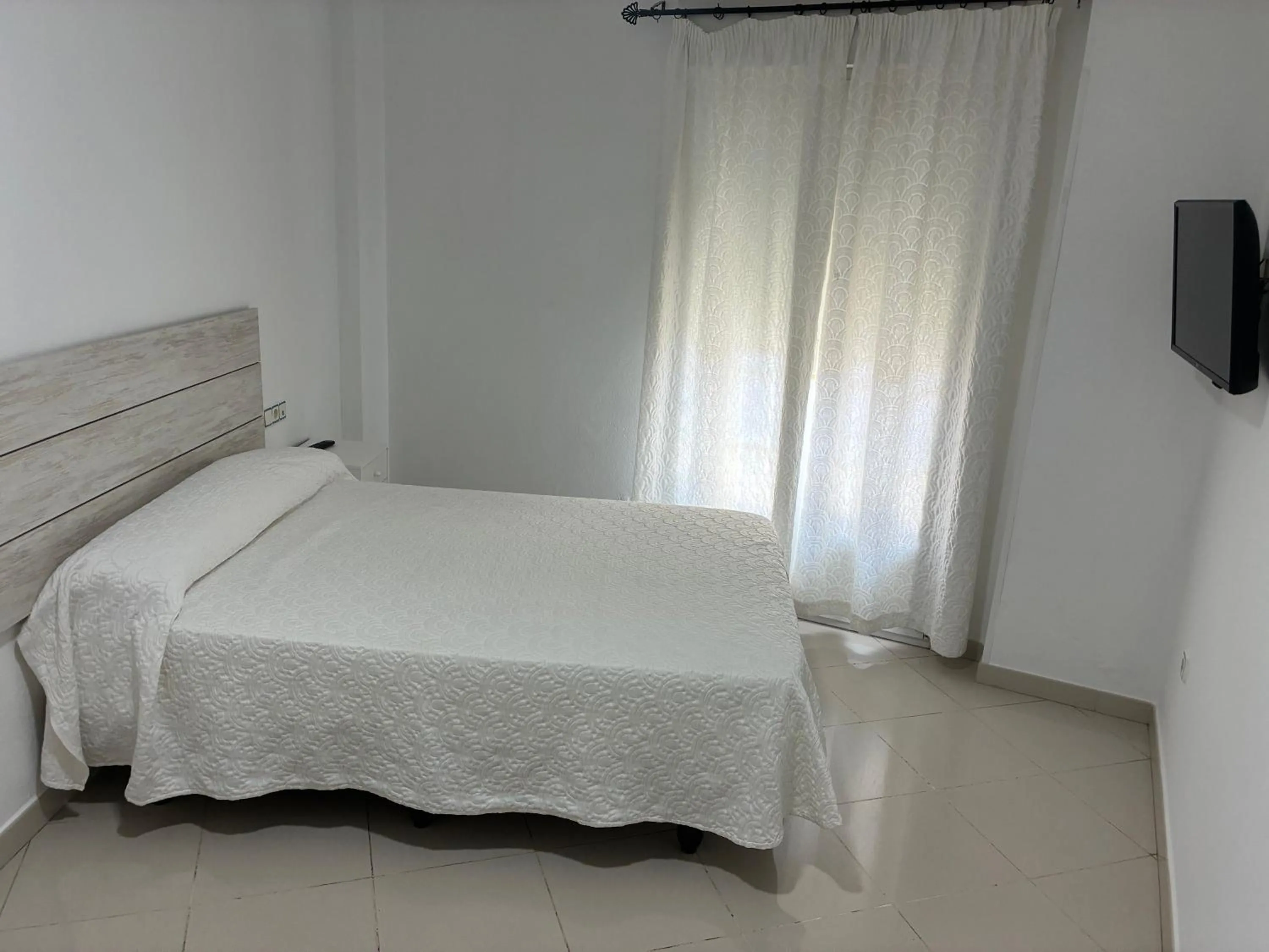 Bed in Hostal Restaurante La Niña