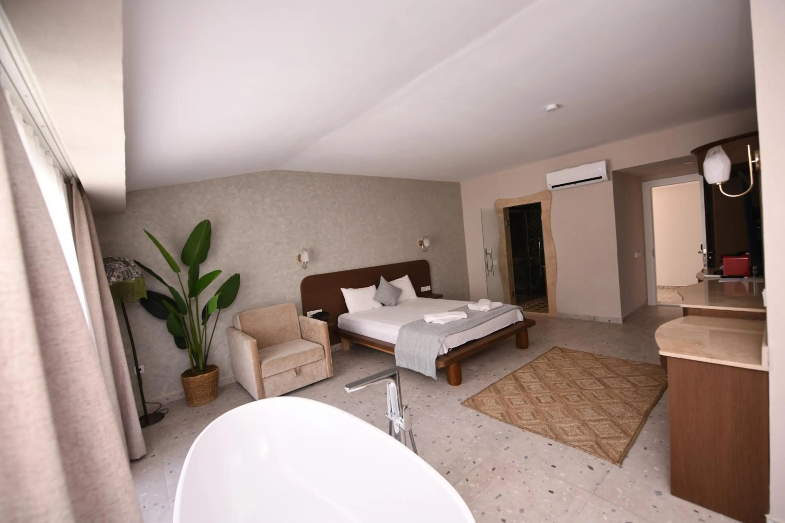 Bed in Montebello Deluxe Hotel