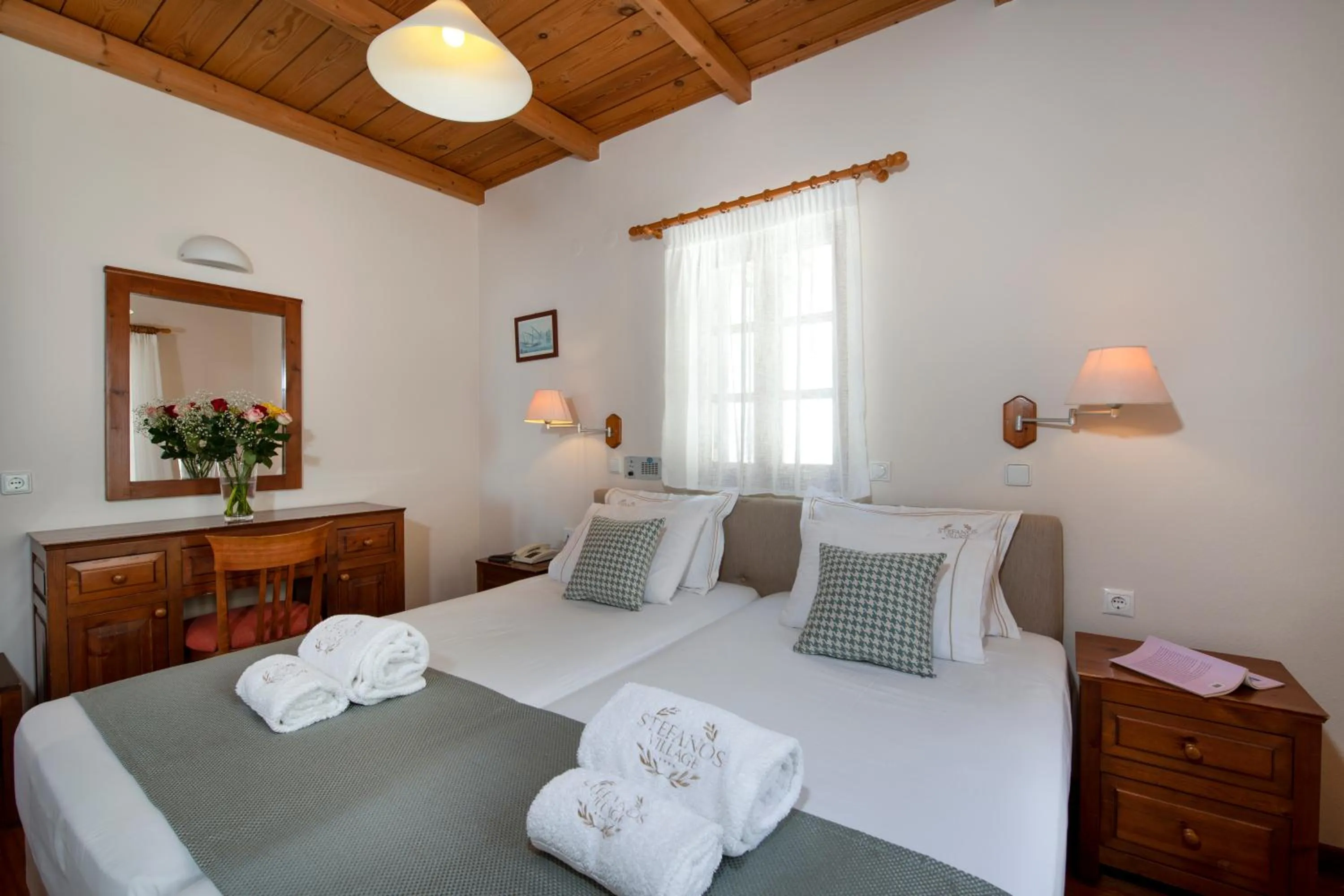 Bed in Stefanos Village Hotel