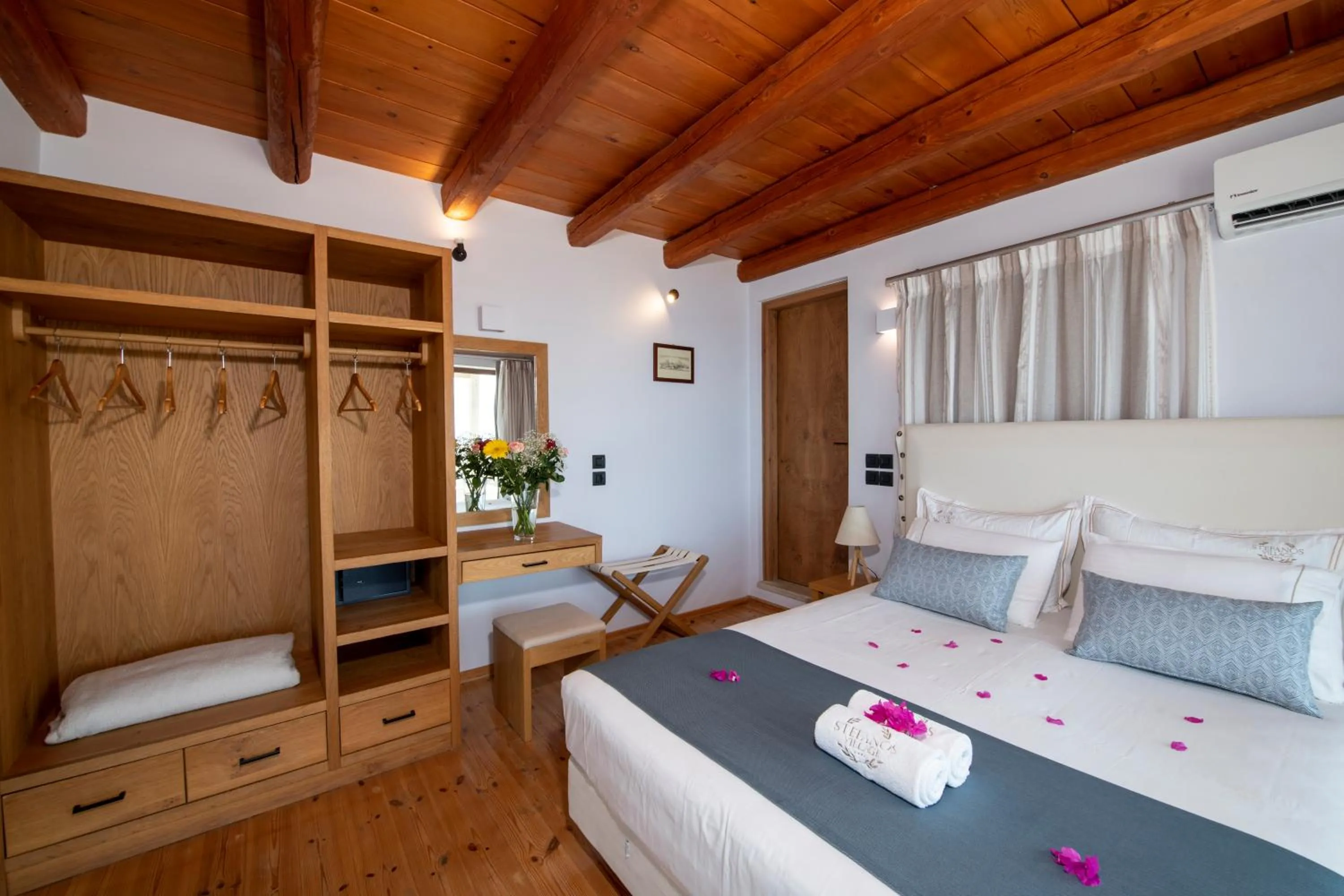 Bed in Stefanos Village Hotel