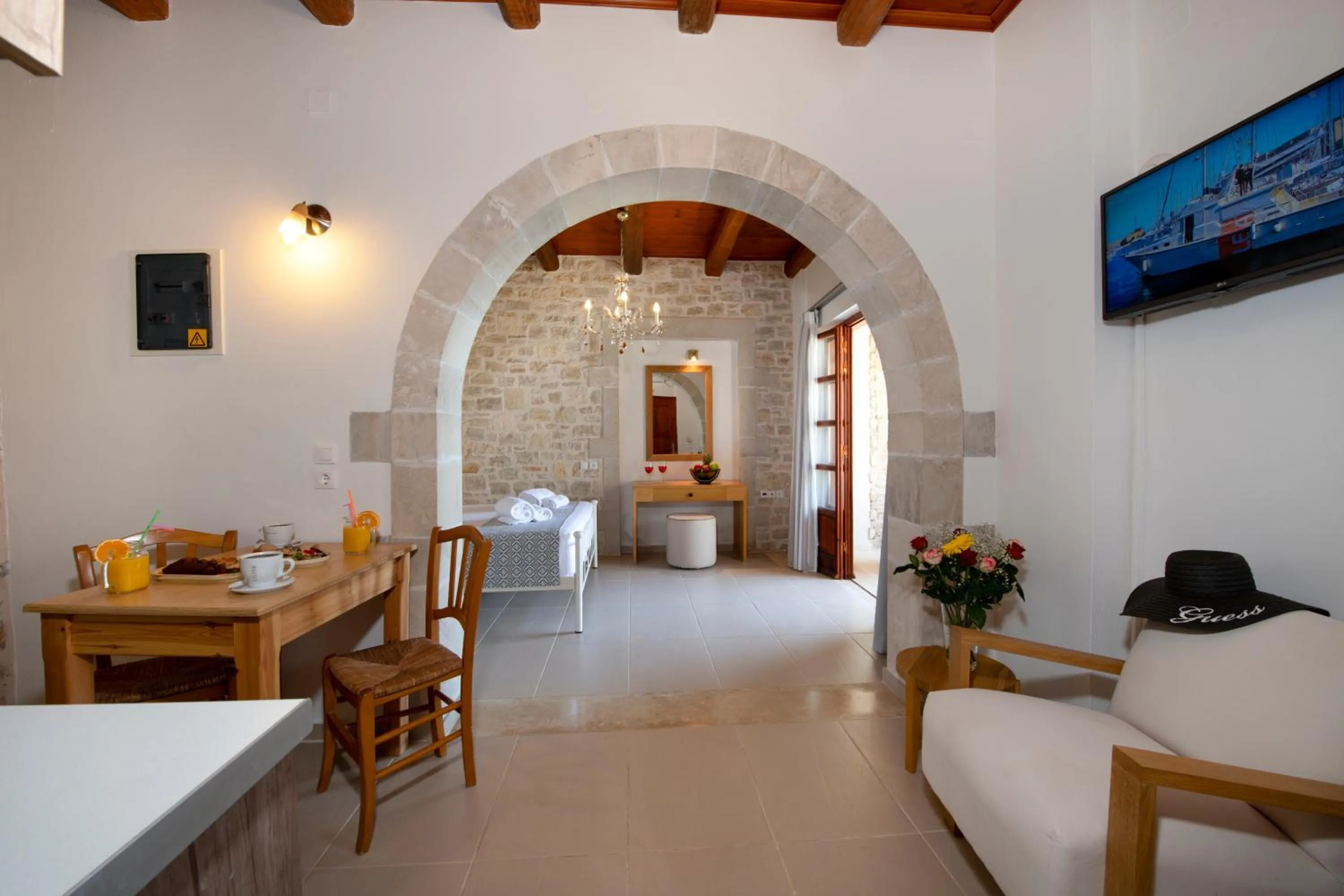 Dining area, Bed in Stefanos Village Hotel