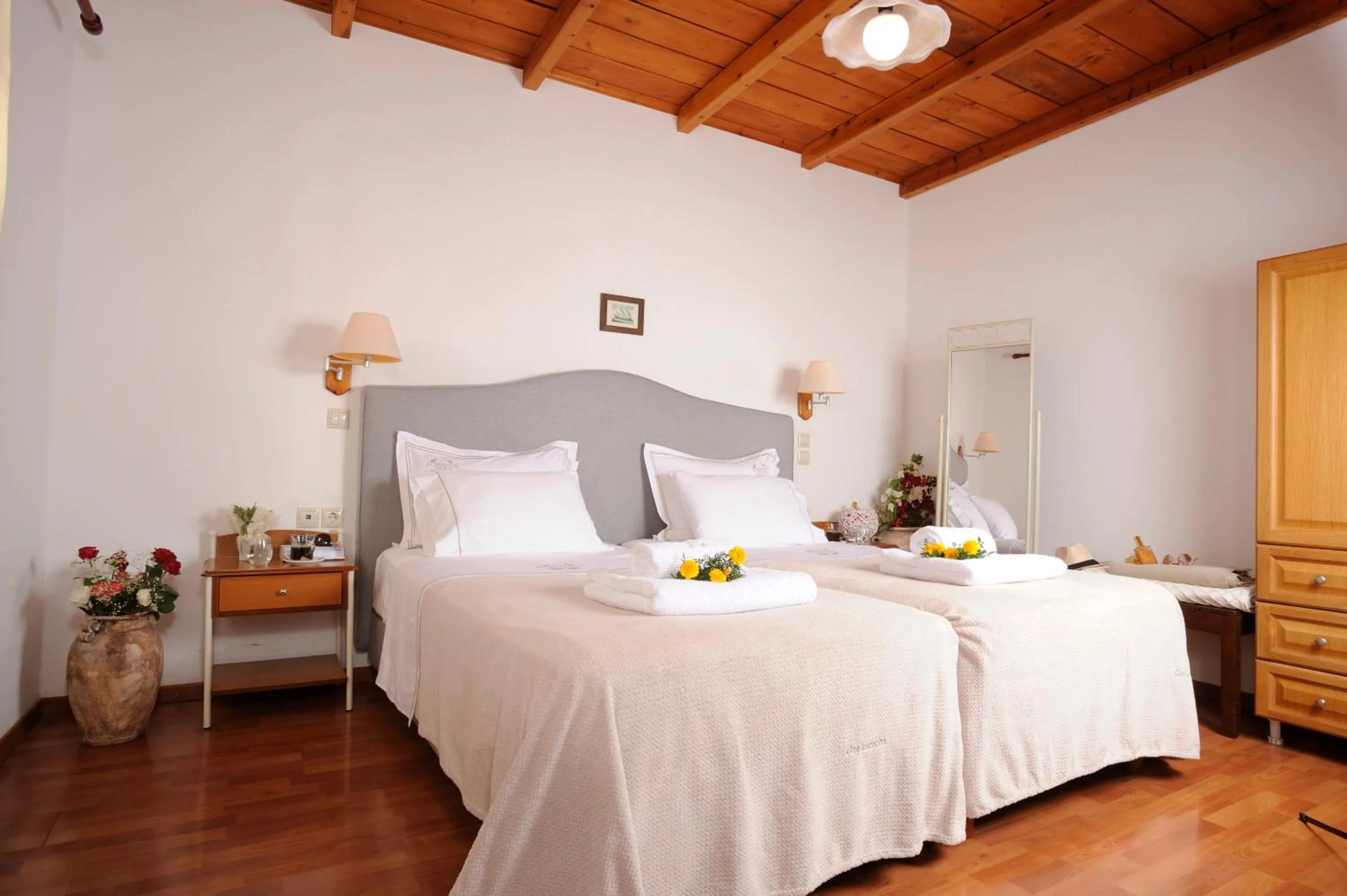 Bed in Stefanos Village Hotel