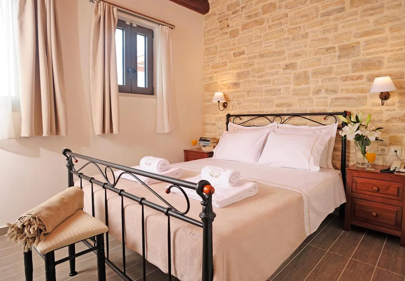 Bed in Stefanos Village Hotel
