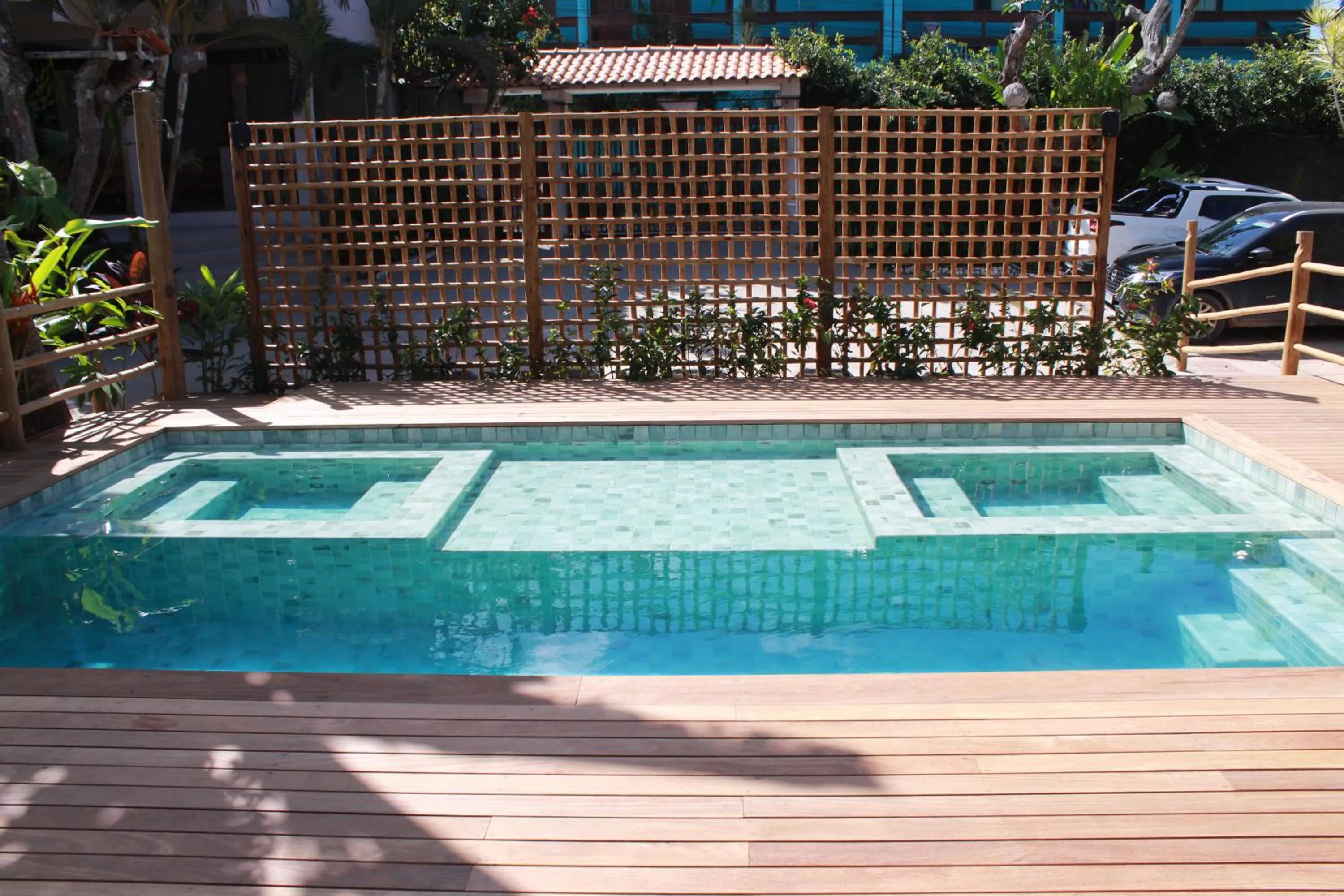 Swimming pool in Pousada Encantos de Arraial