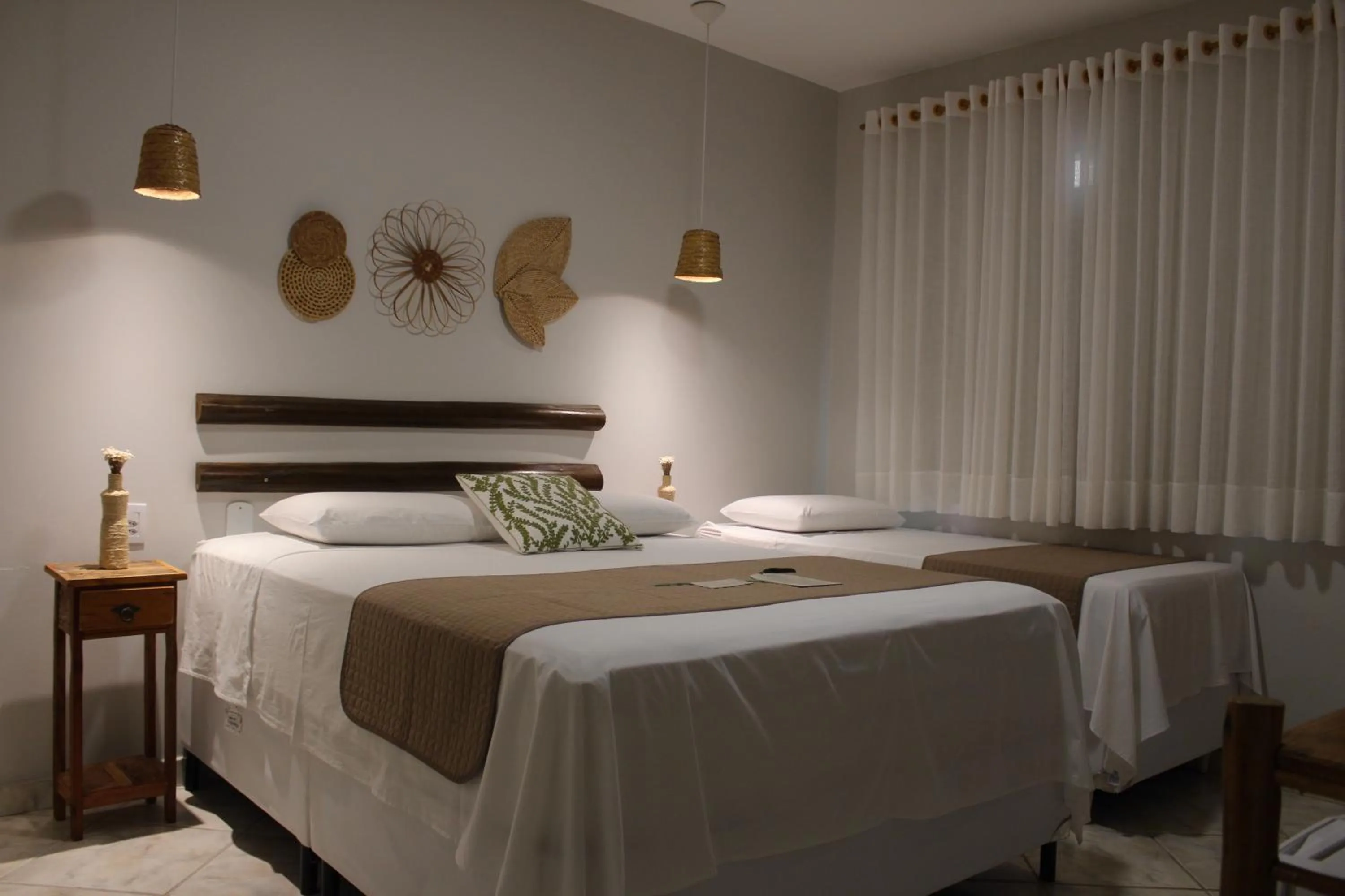 Bed in Pousada Encantos de Arraial