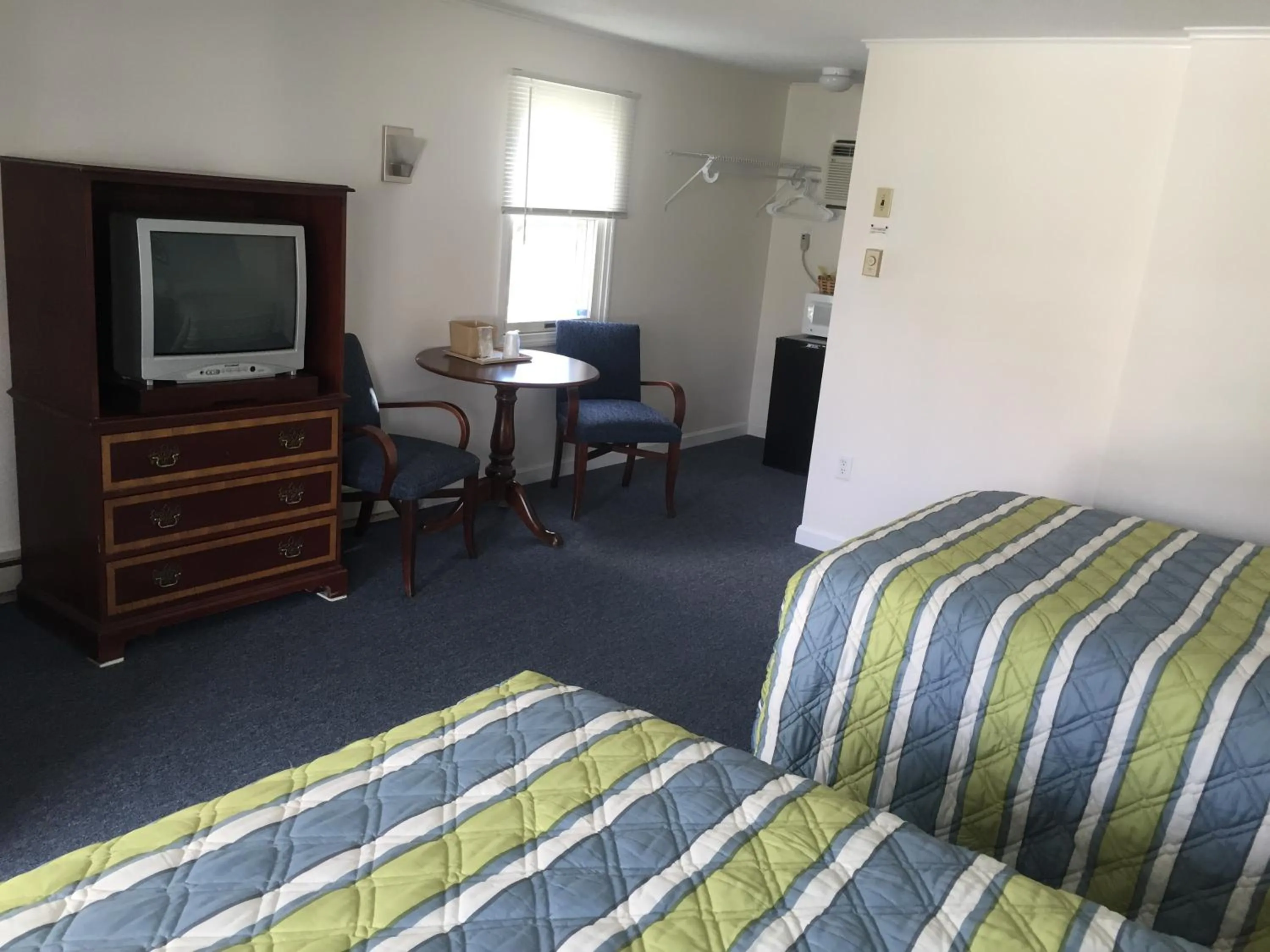 Bed in Ne'r Beach Motel