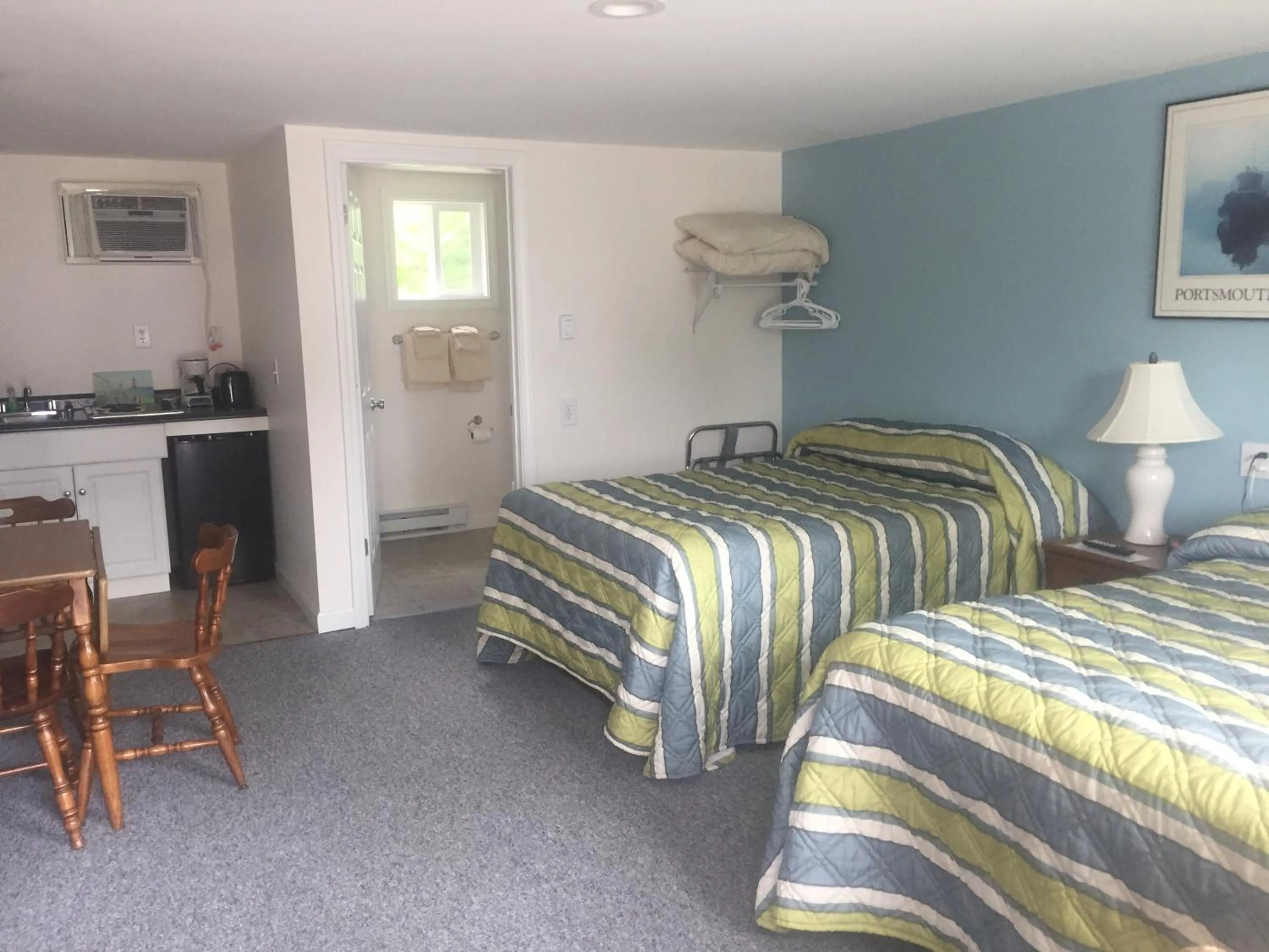 Bed in Ne'r Beach Motel