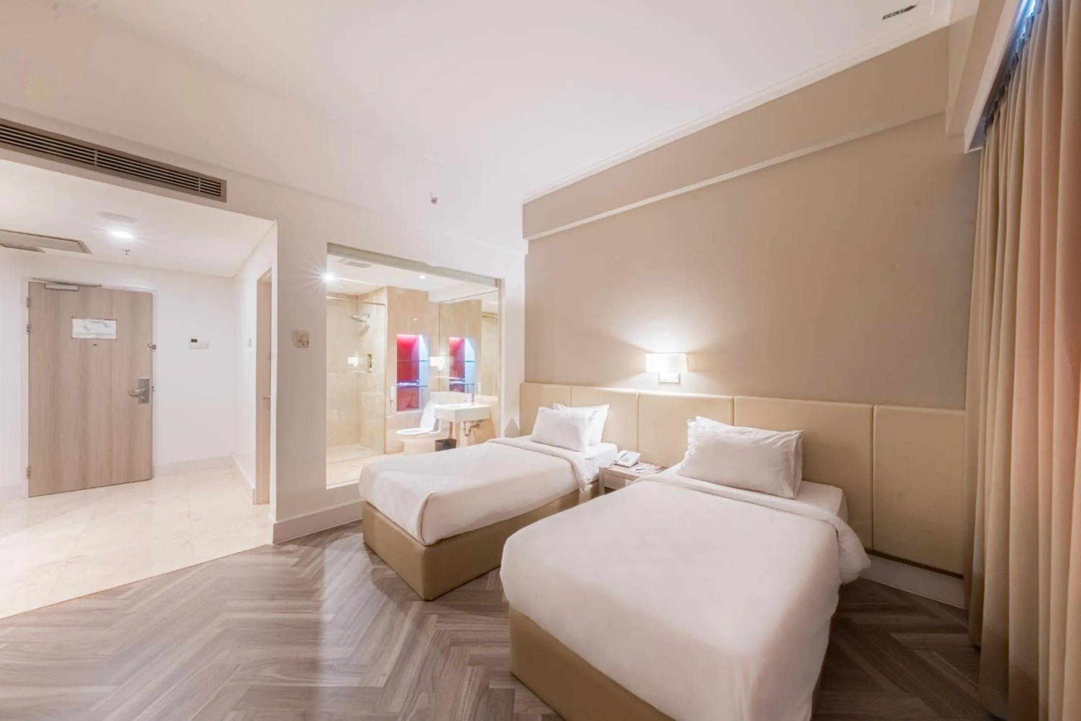 Coffee/tea facilities, Bed in Grand Jatra Hotel Balikpapan