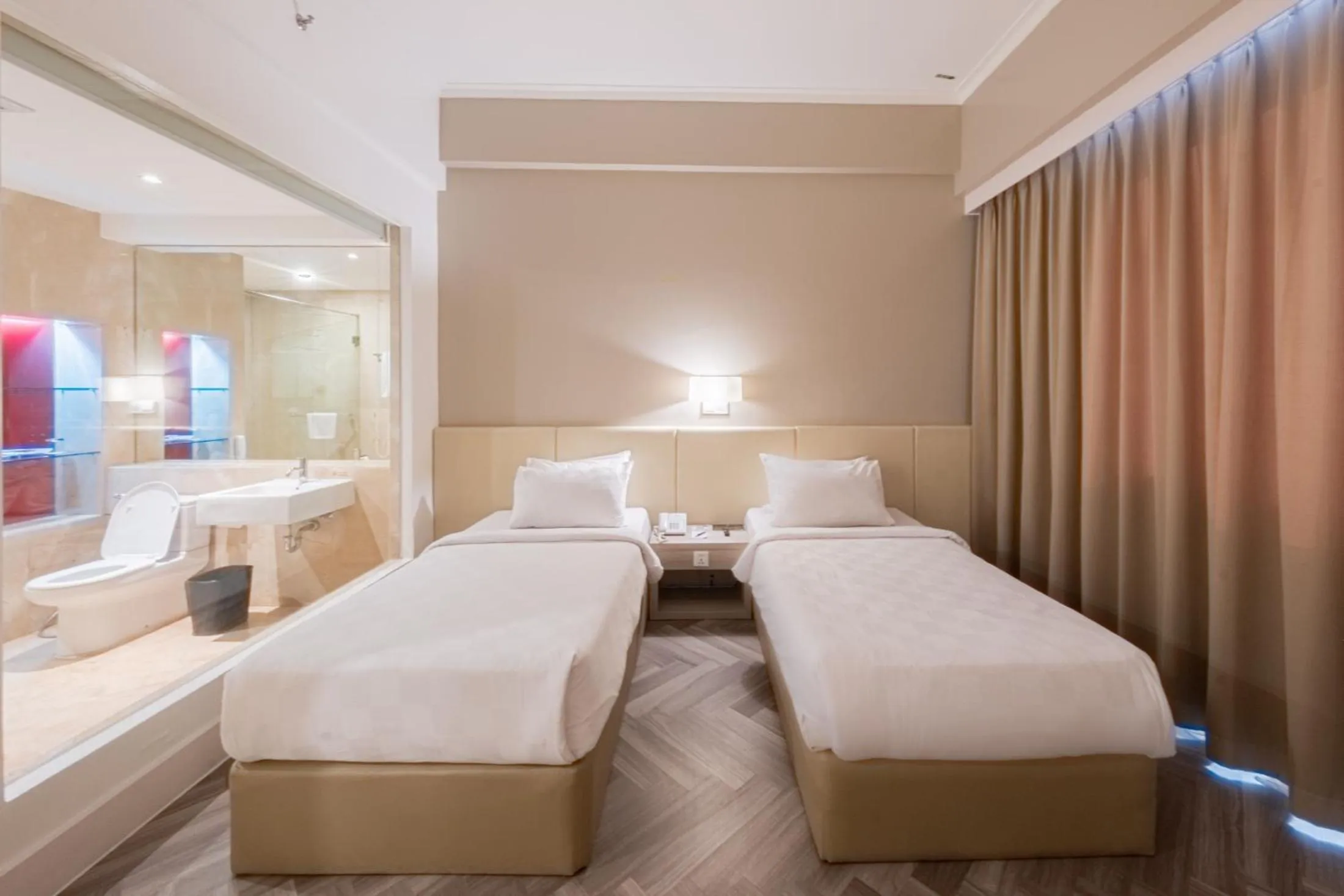 Photo of the whole room, Bed in Grand Jatra Hotel Balikpapan