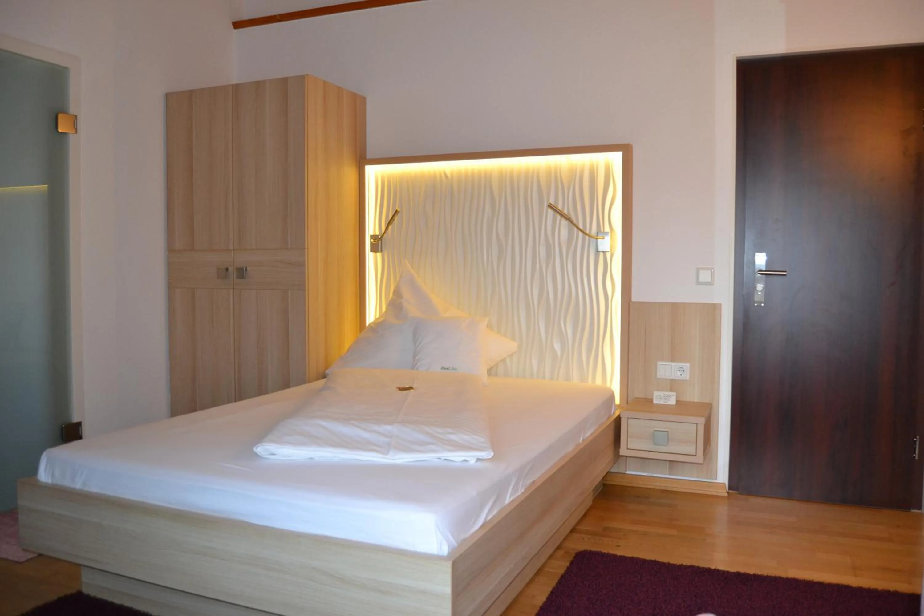 Photo of the whole room, Bed in Iris am See garni