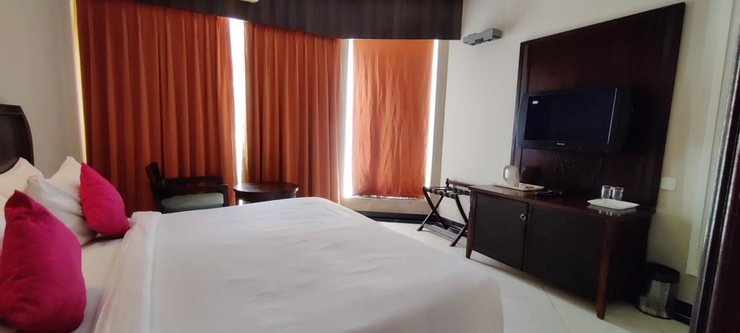 Bedroom, TV/Entertainment Center in Living Room by Seasons, Goa