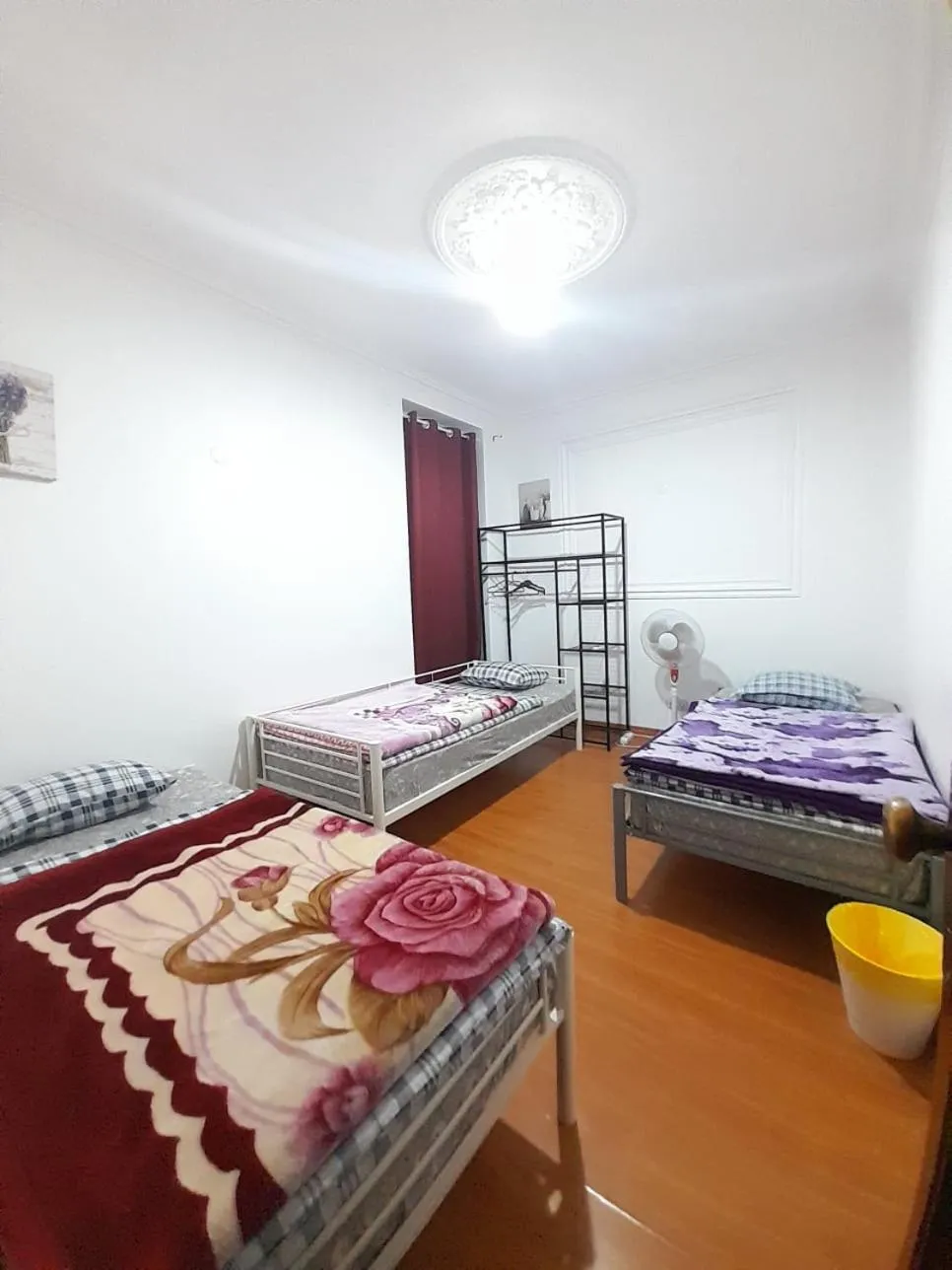 Bed in Garden Guest House