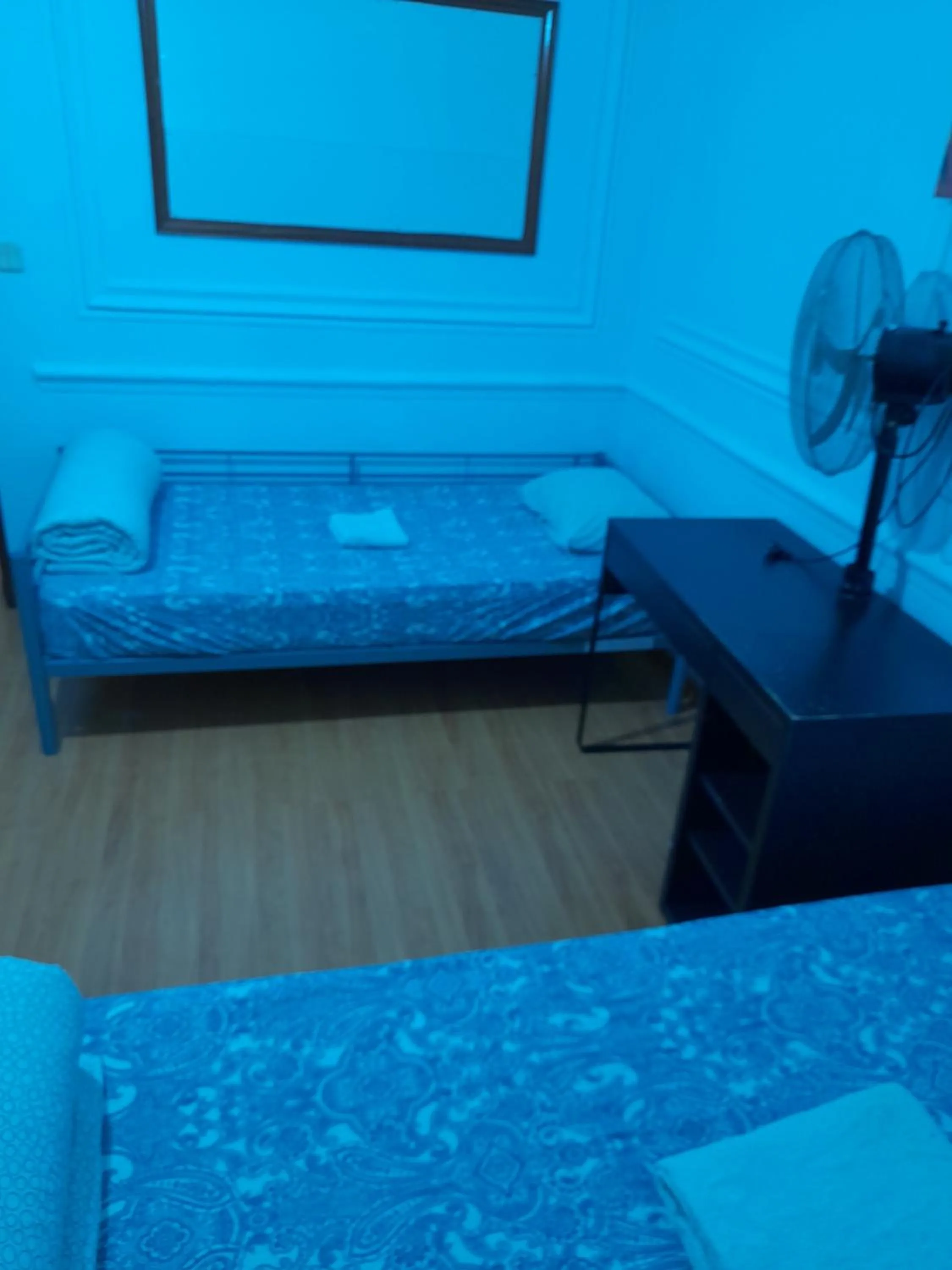 Bed in Garden Guest House