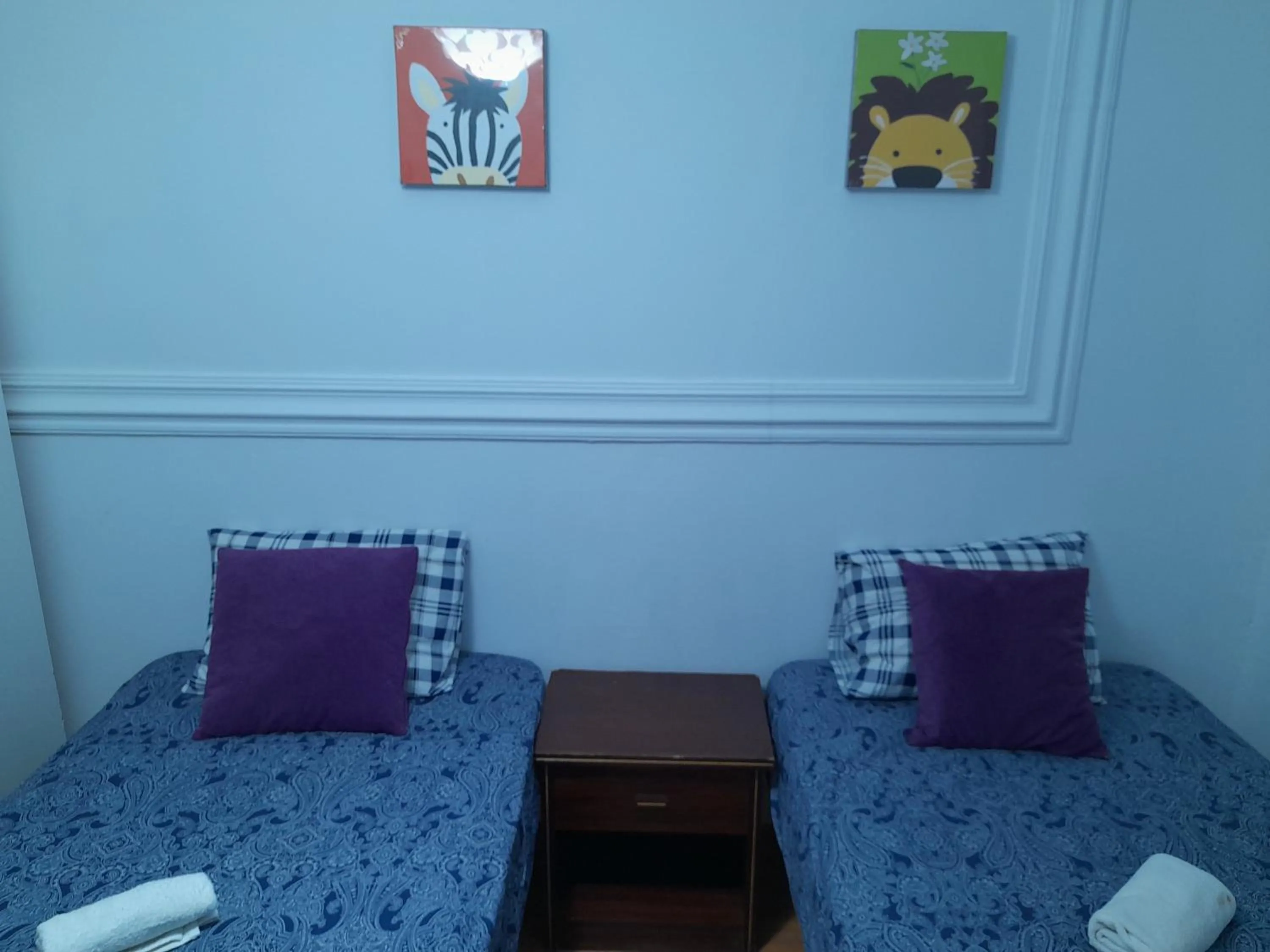 Bed in Garden Guest House