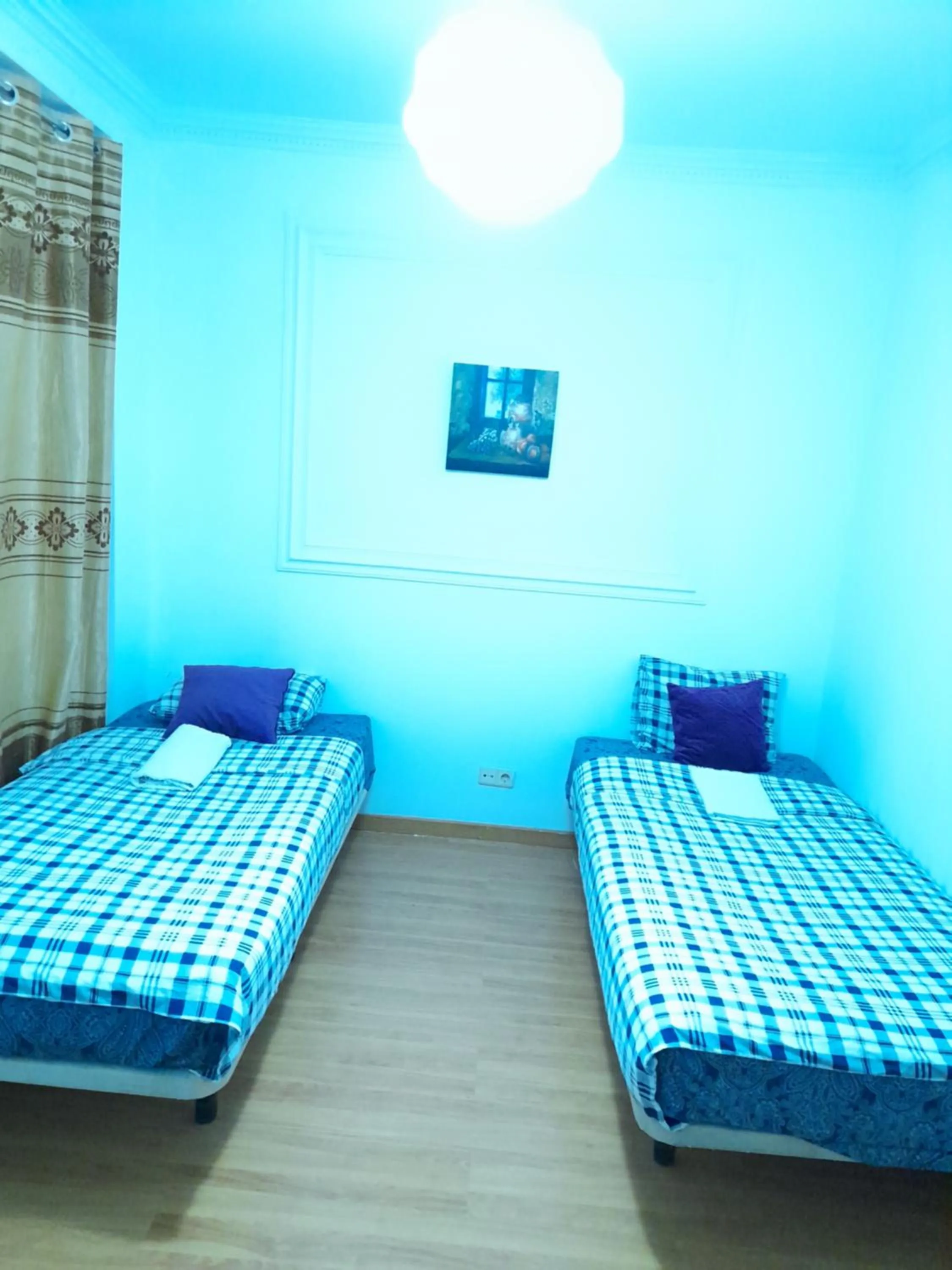 Bed in Garden Guest House