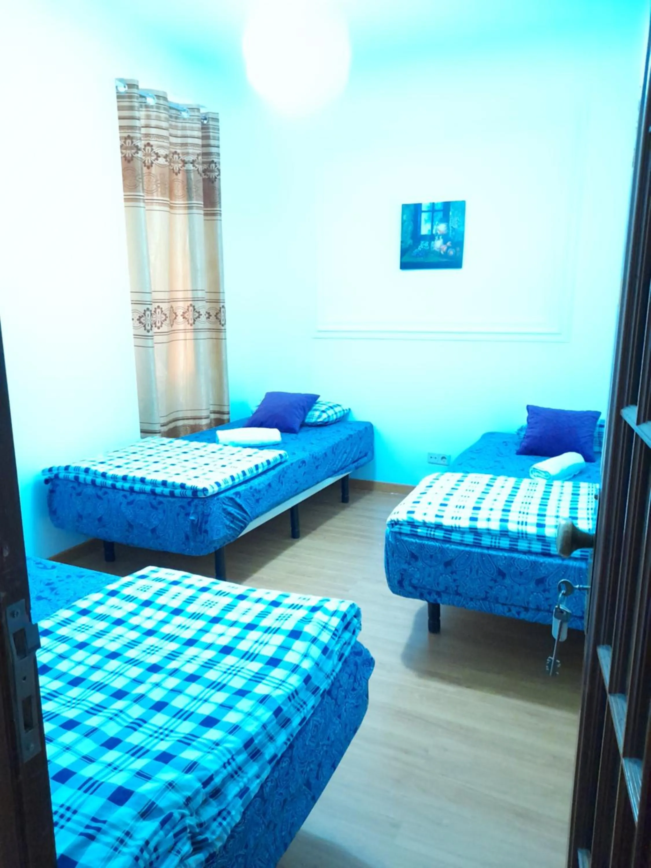 Bed in Garden Guest House