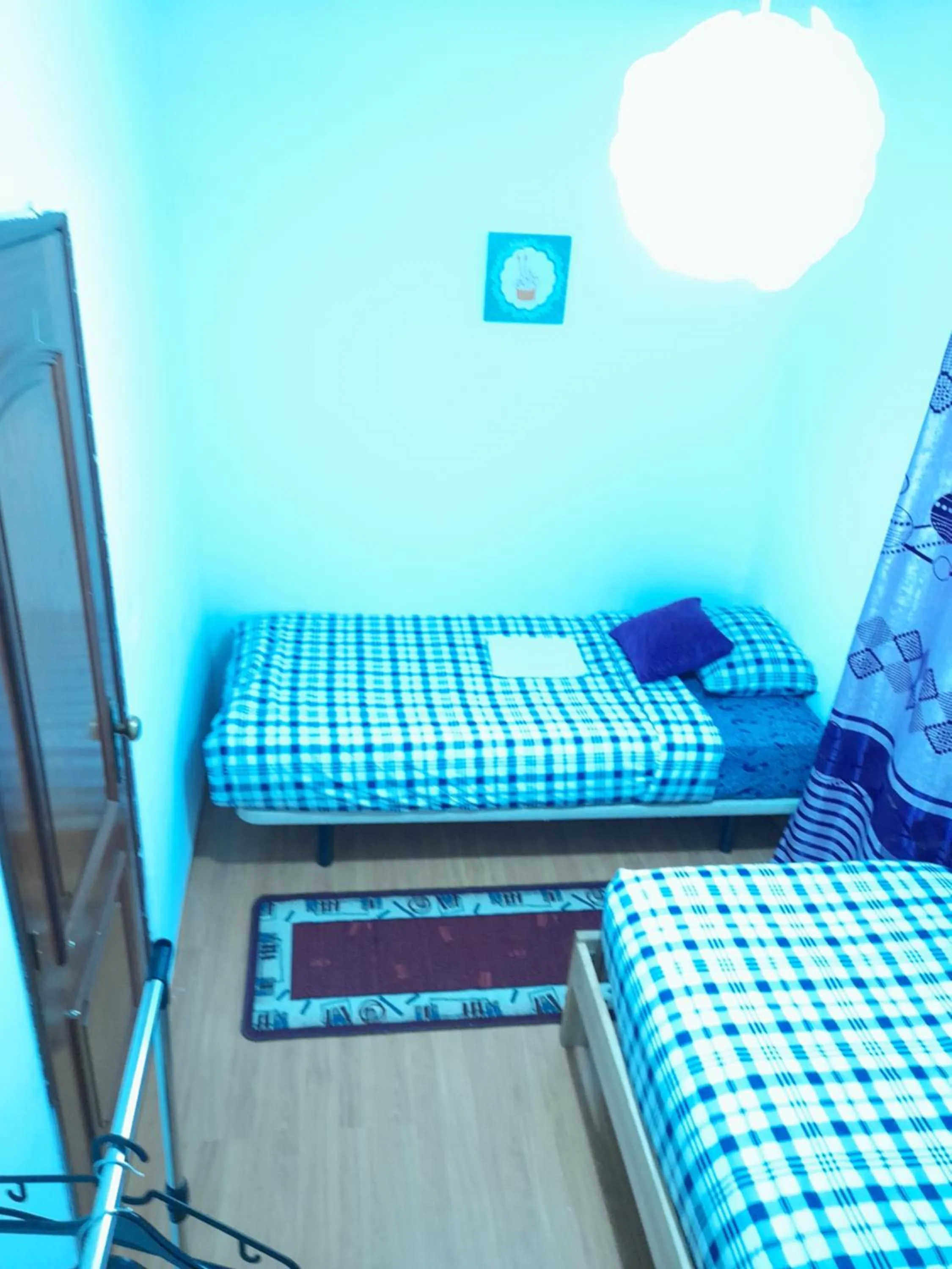 Bed in Garden Guest House