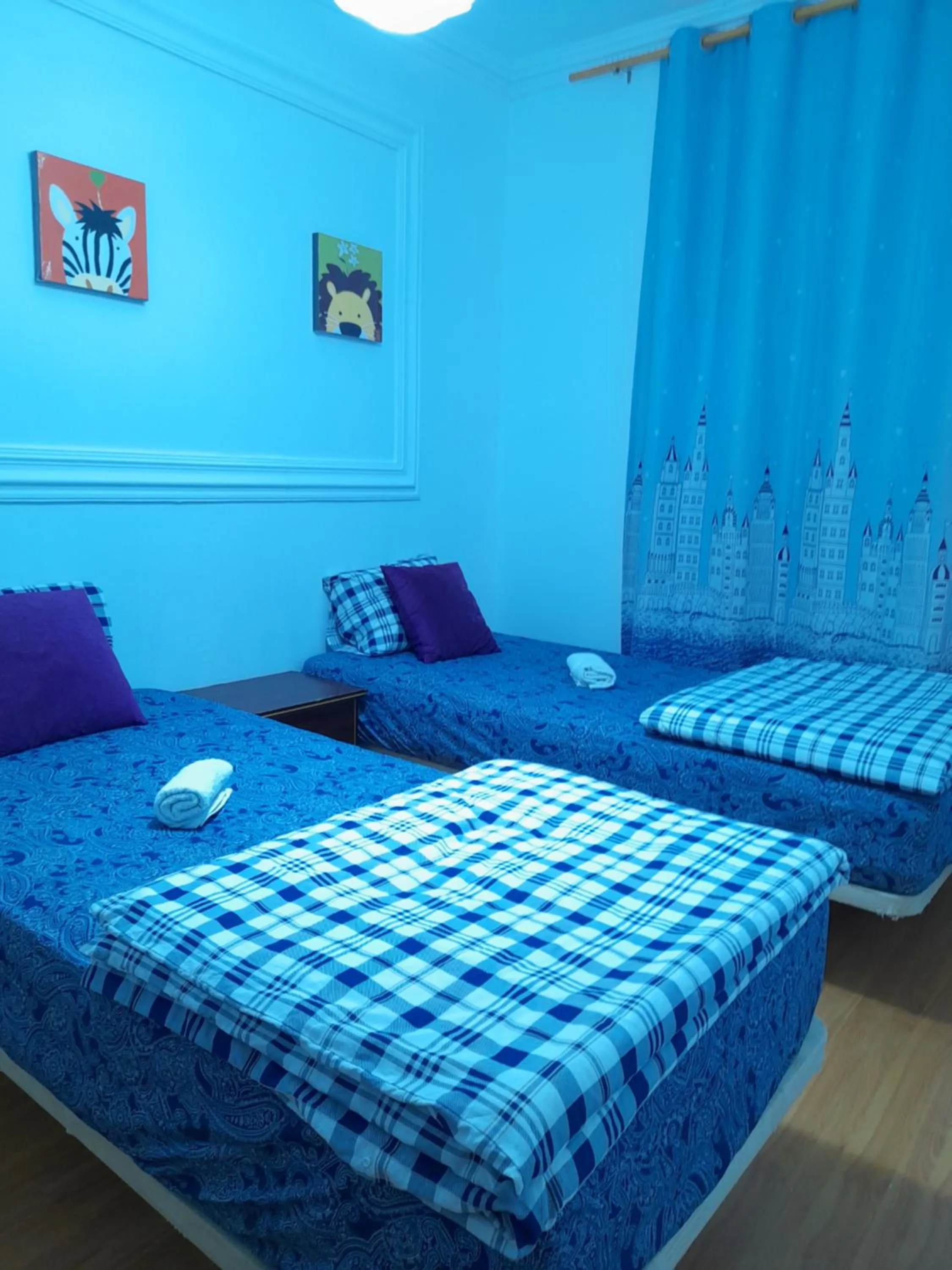 Bed in Garden Guest House