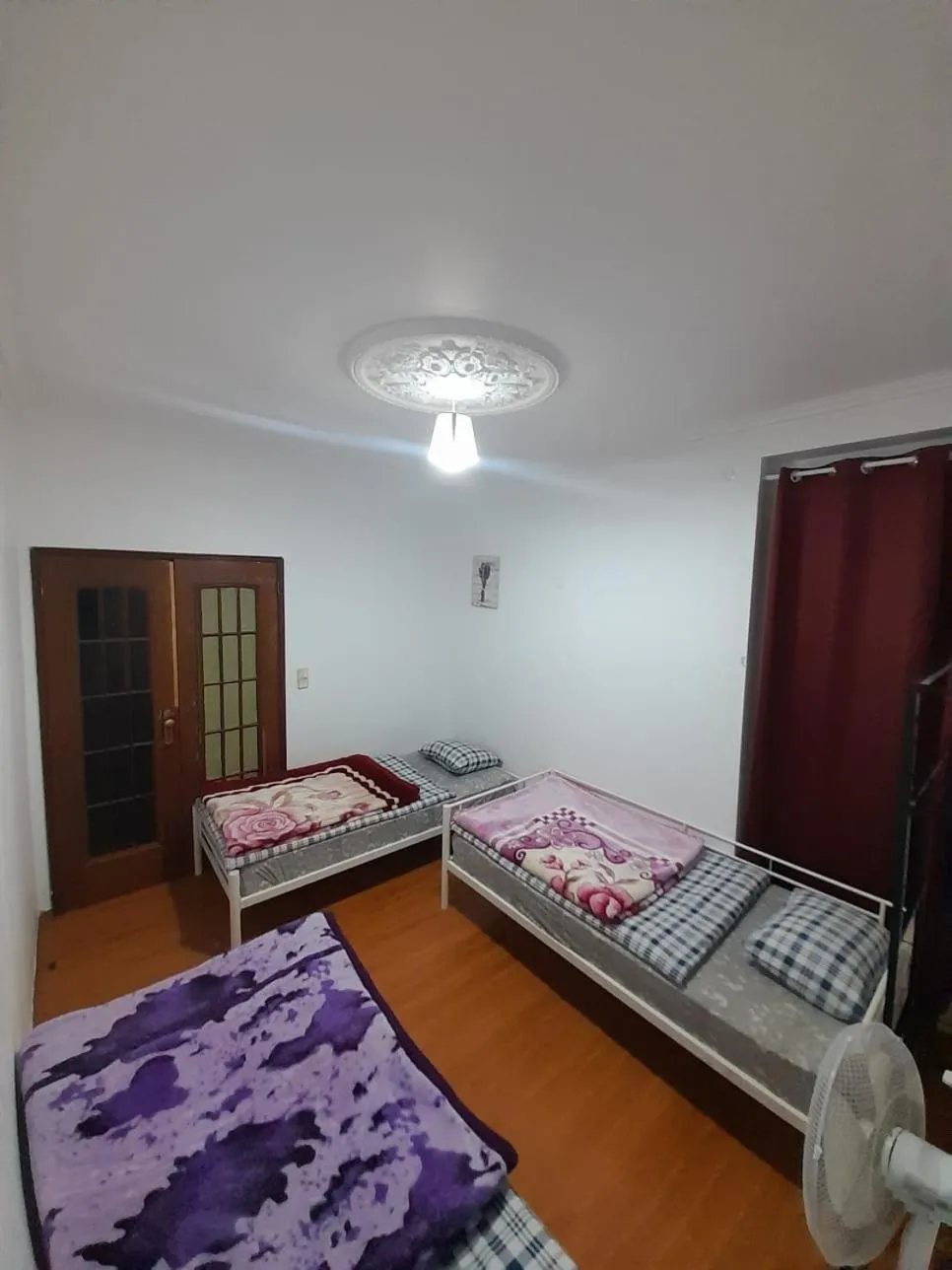 Bed in Garden Guest House