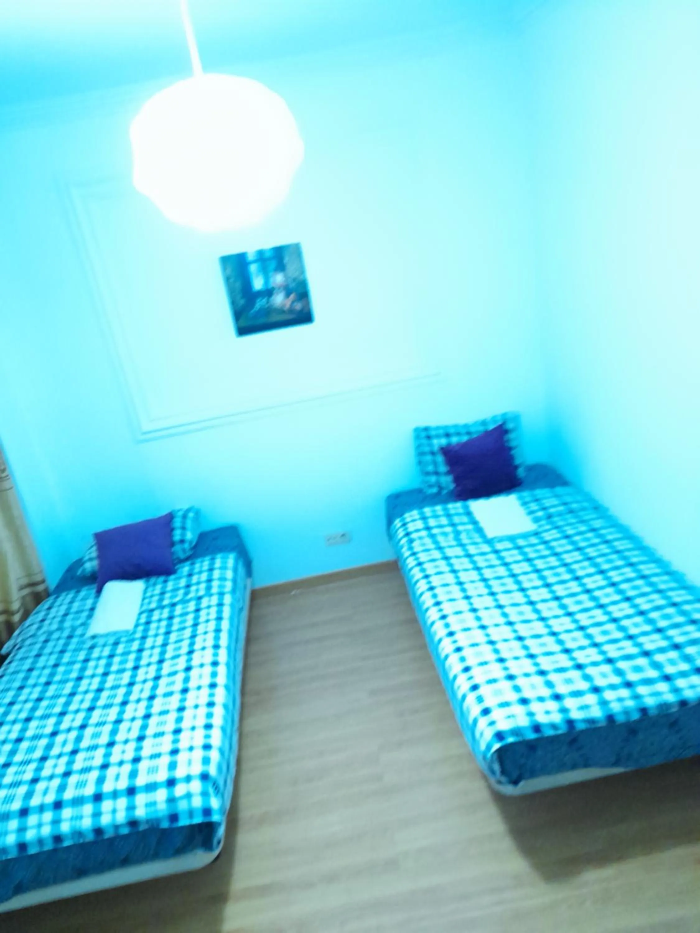 Bed in Garden Guest House