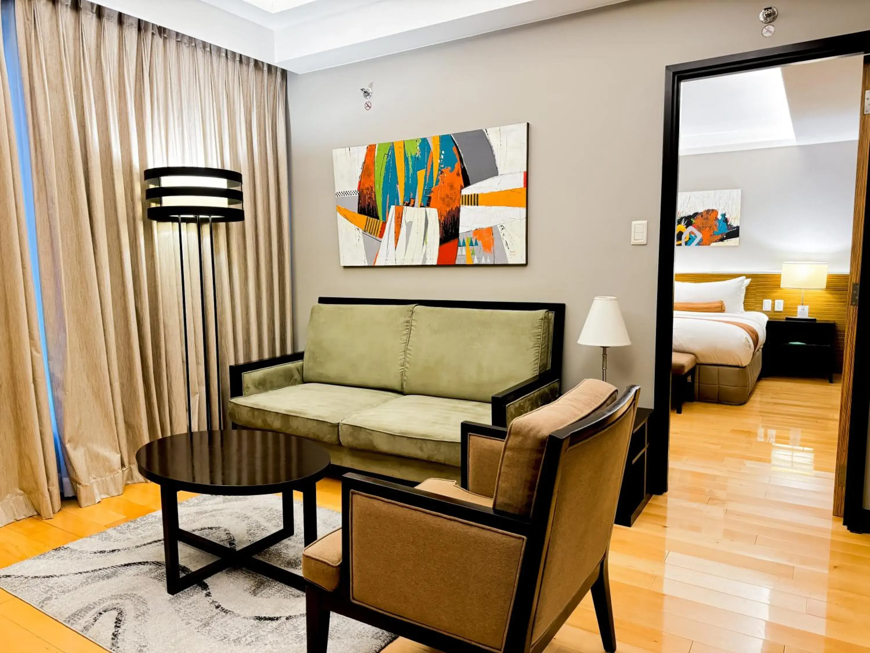 Living room, Bed in The Bellevue Manila Living room, Bed in The Bellevue Manila