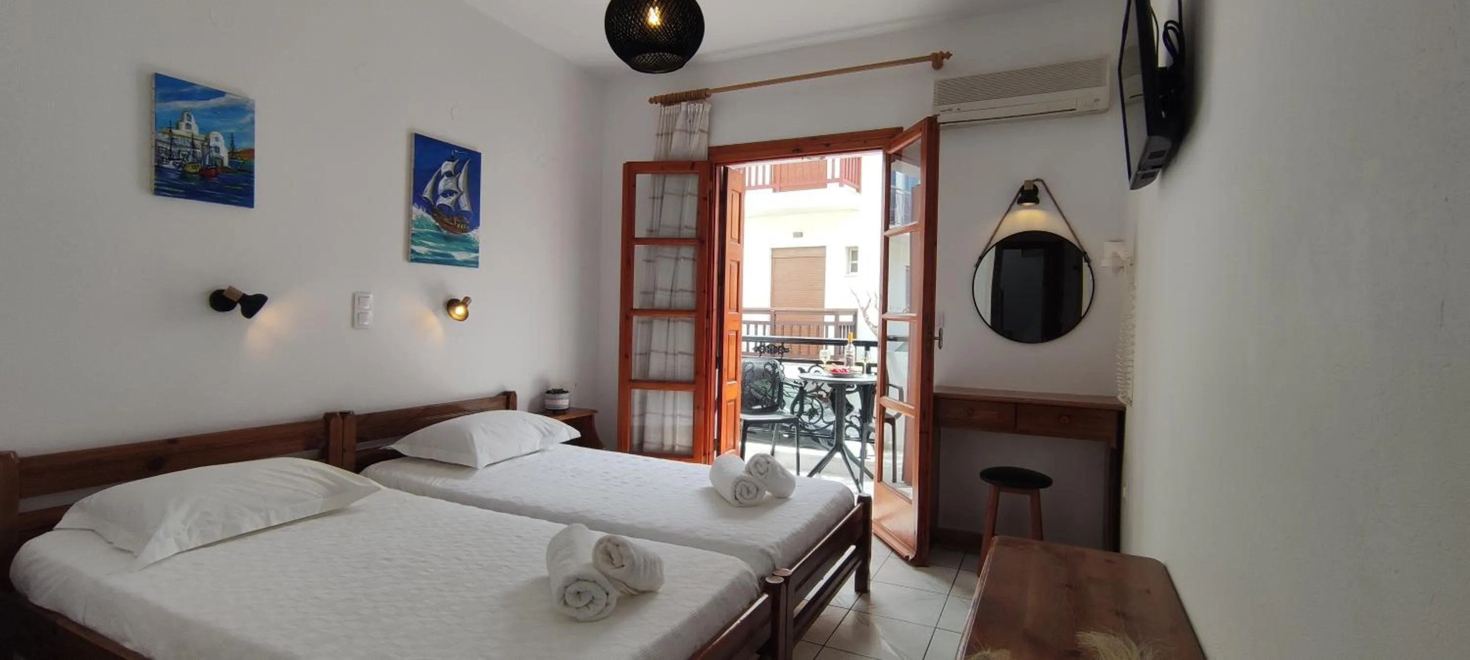 Bed in Kapetanos Rooms